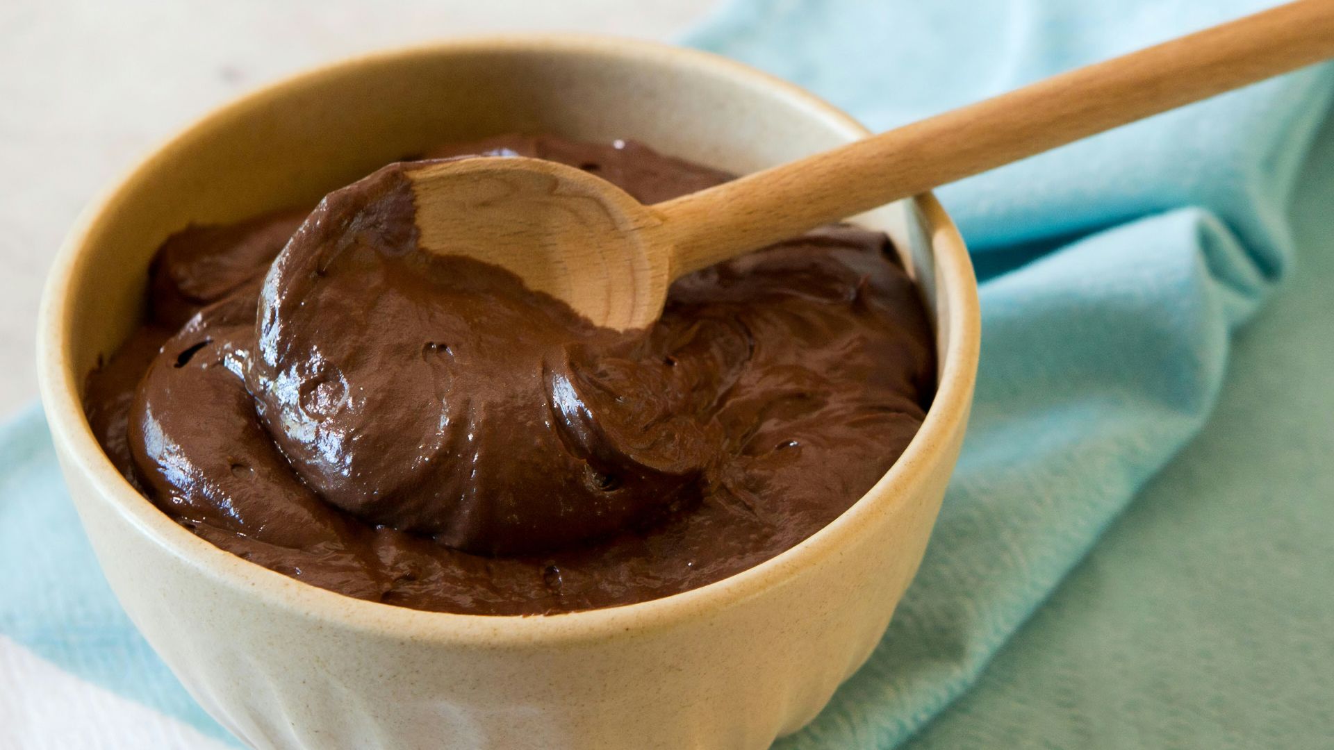 brown chocolate on white ceramic bowl