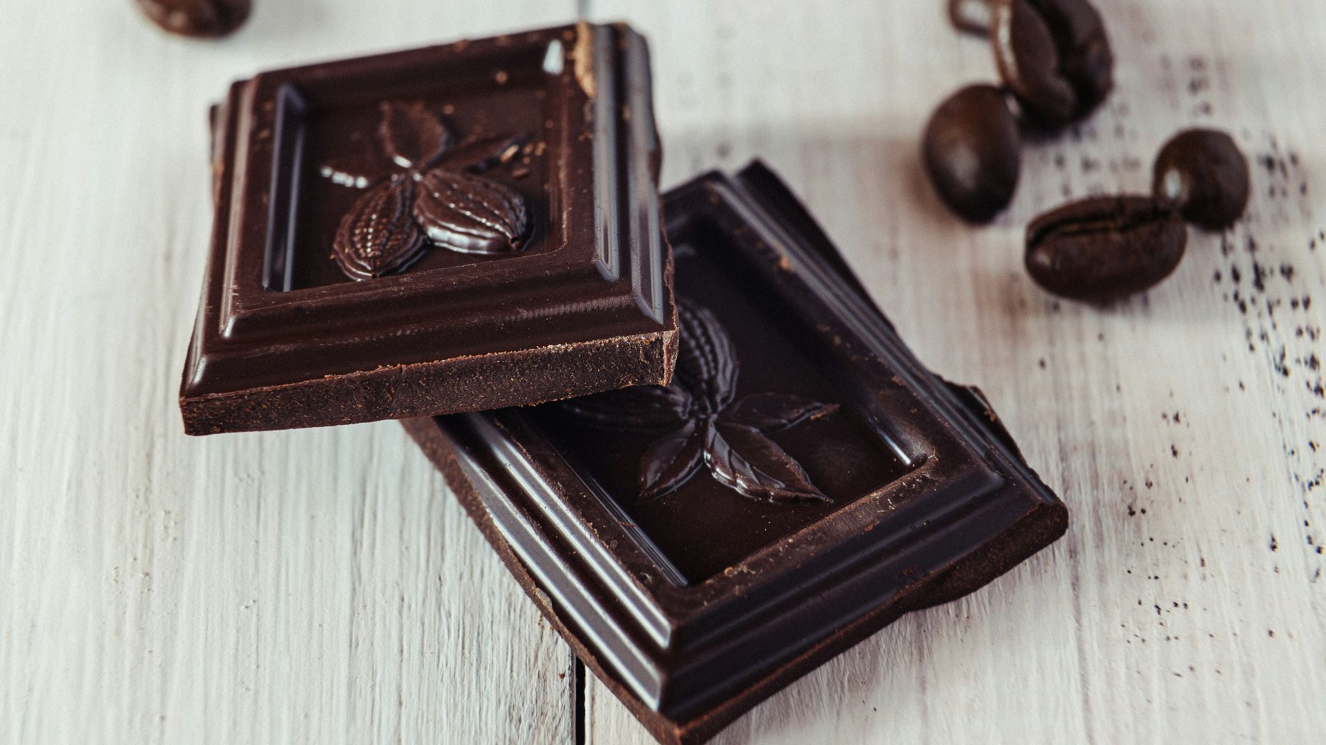 a couple of pieces of chocolate sitting on top of a table