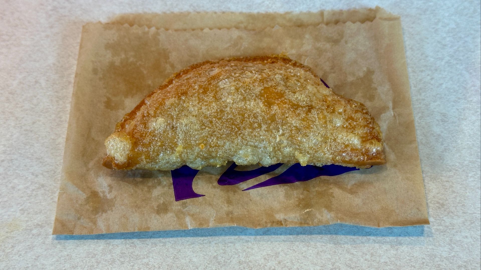 File:Caramel Apple Empanada Taco Bell (54765227378).jpg