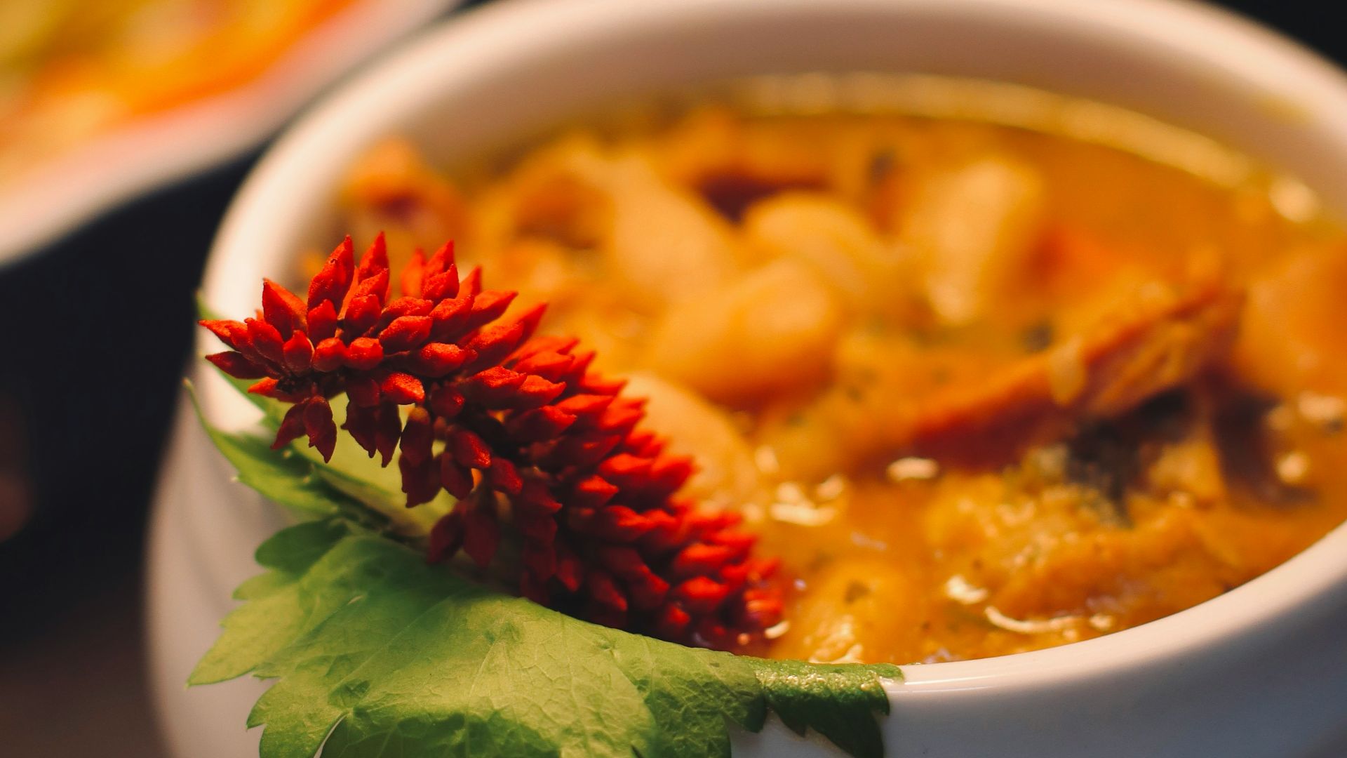 a close up of a bowl of food on a table