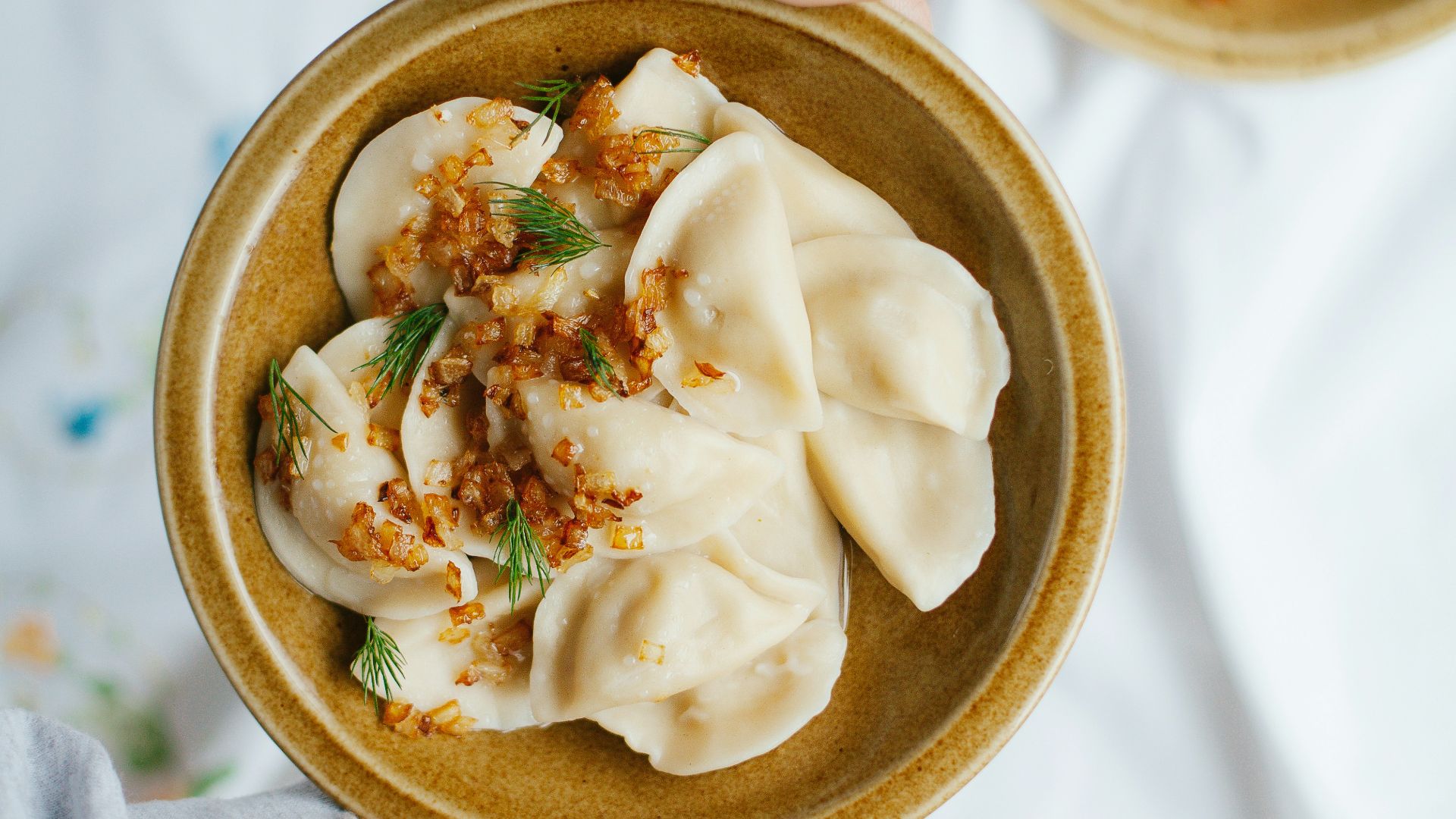 white cream on brown round bowl