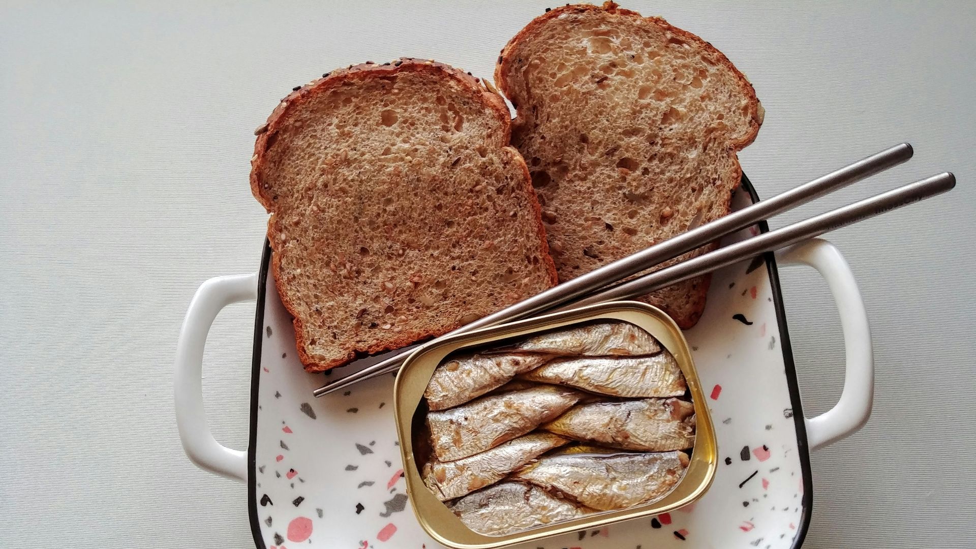 toasted bread on white and red polka dot plate