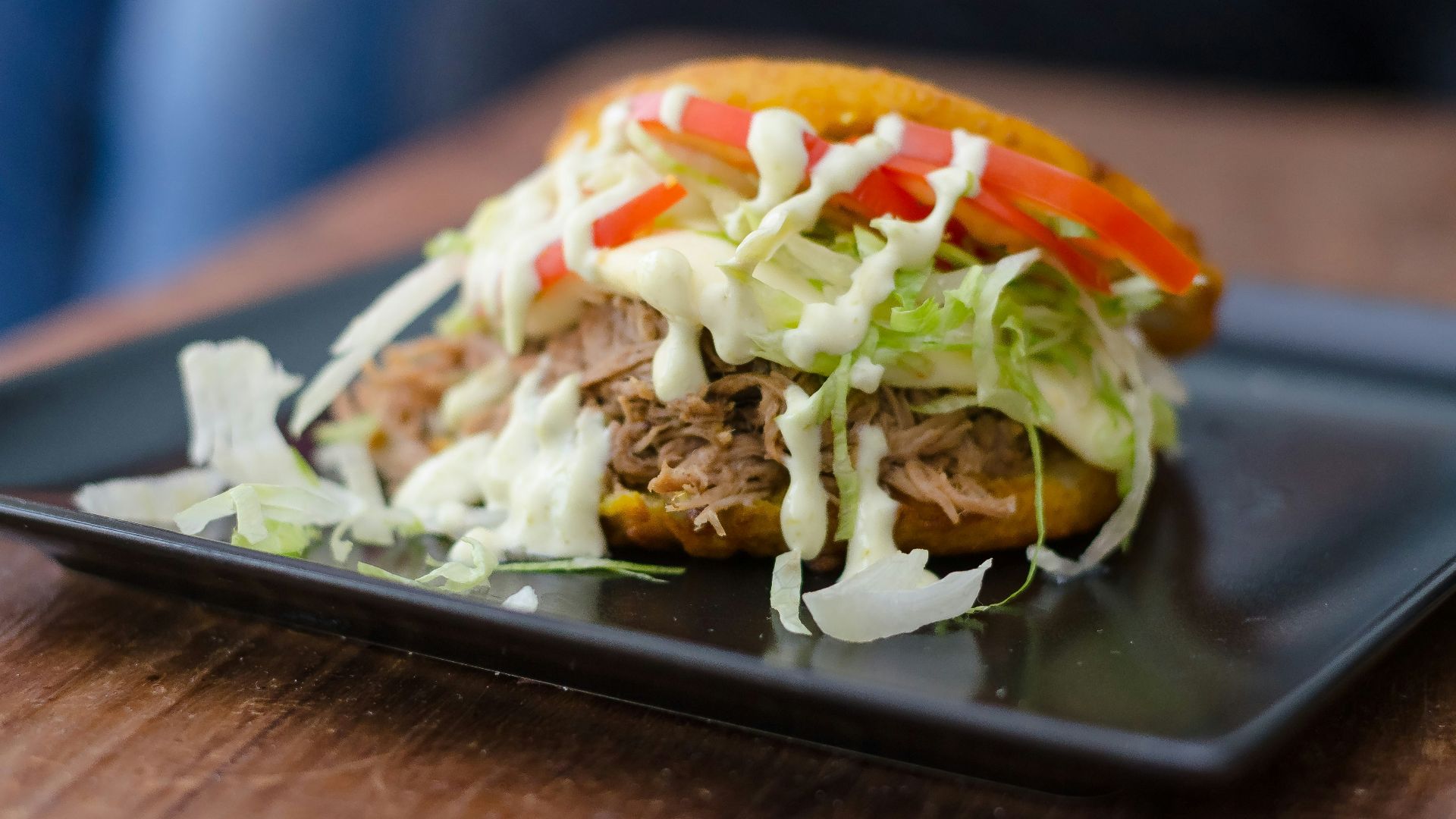 brown and white dish on black rectangular tray
