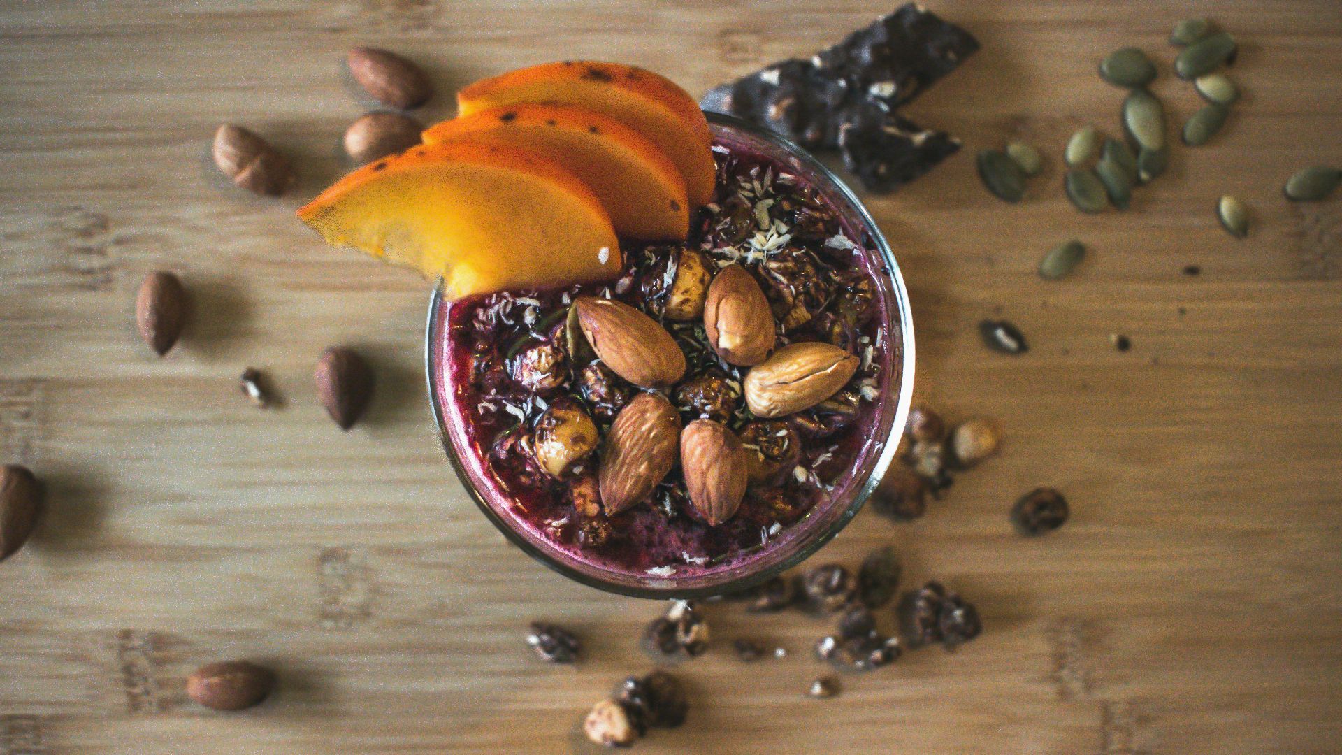 sliced fruit on blue ceramic bowl
