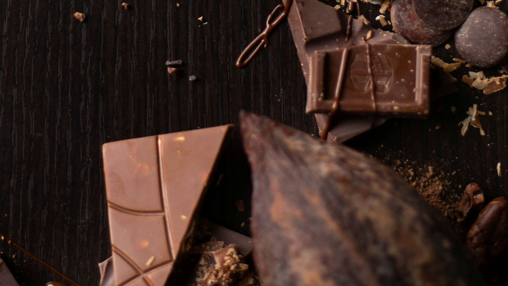 brown wooden stick on black wooden surface