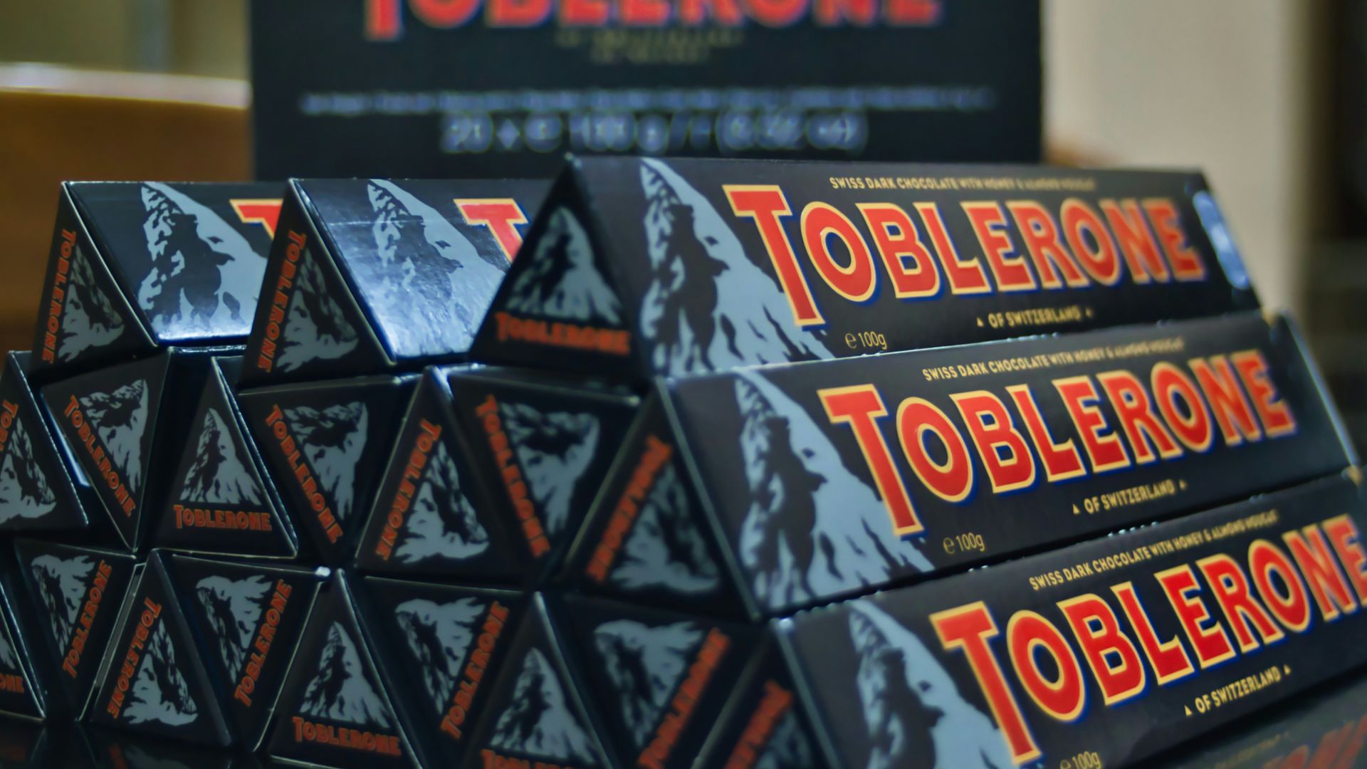 black and red box on brown wooden table