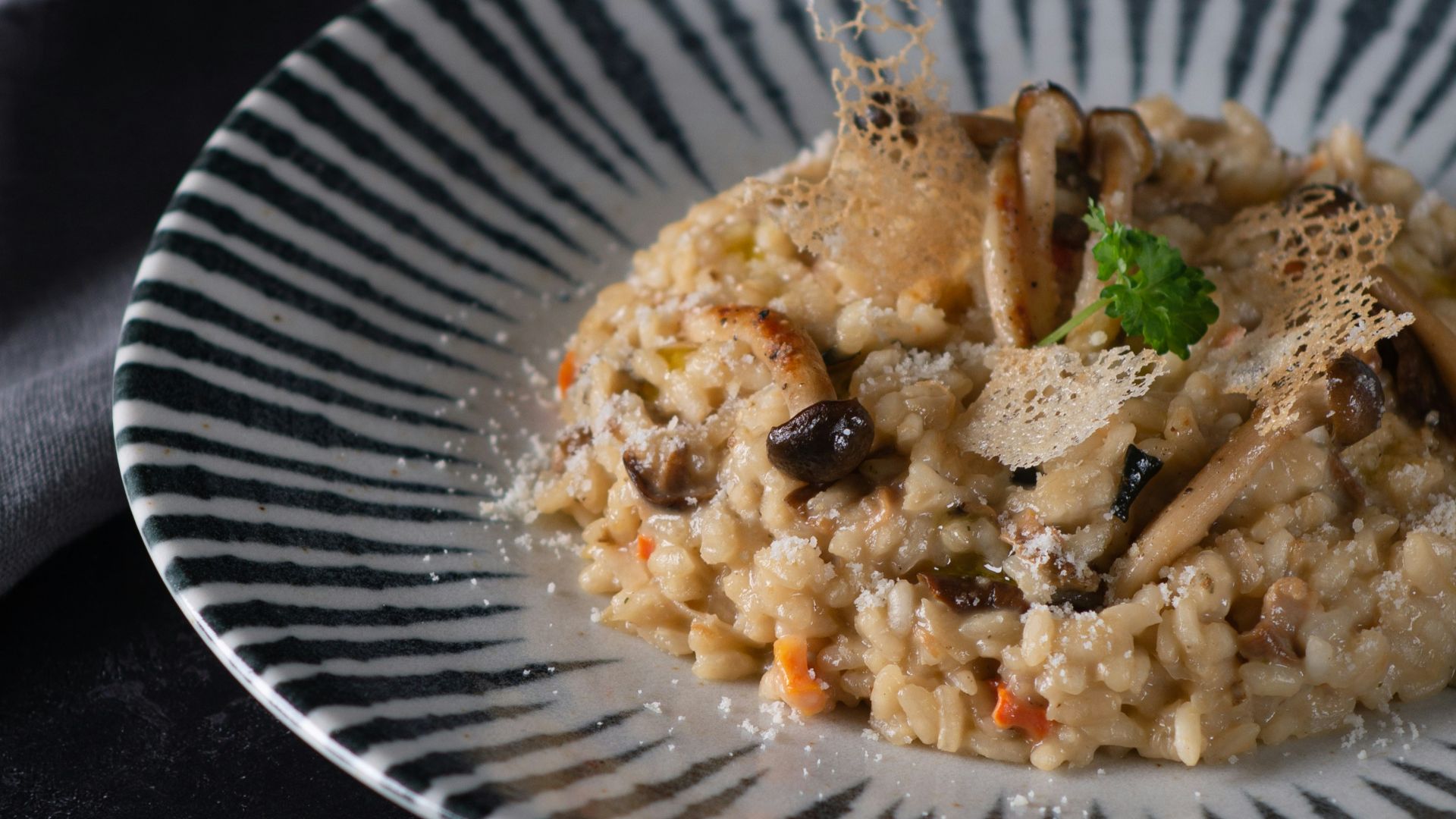 cooked rice with green vegetable on white round plate