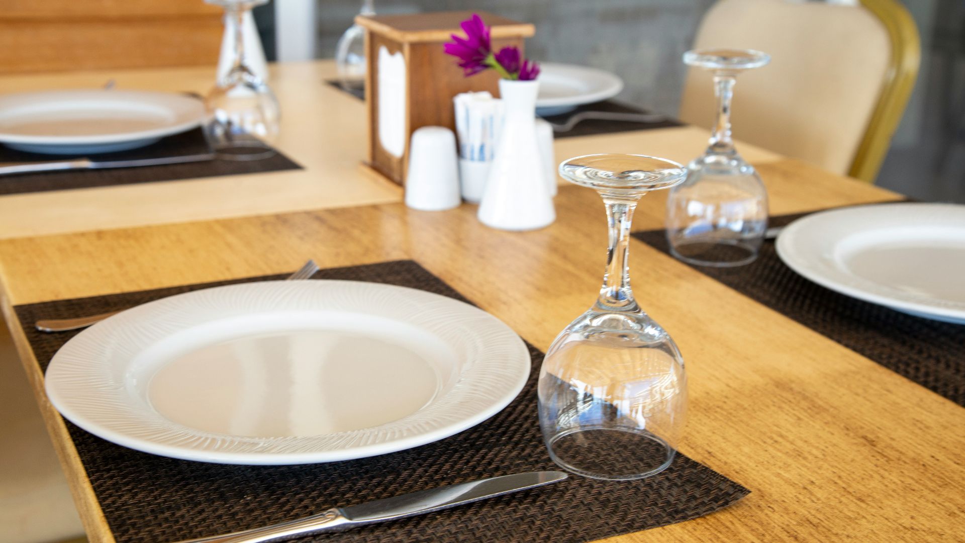 clear wine glass on brown wooden table