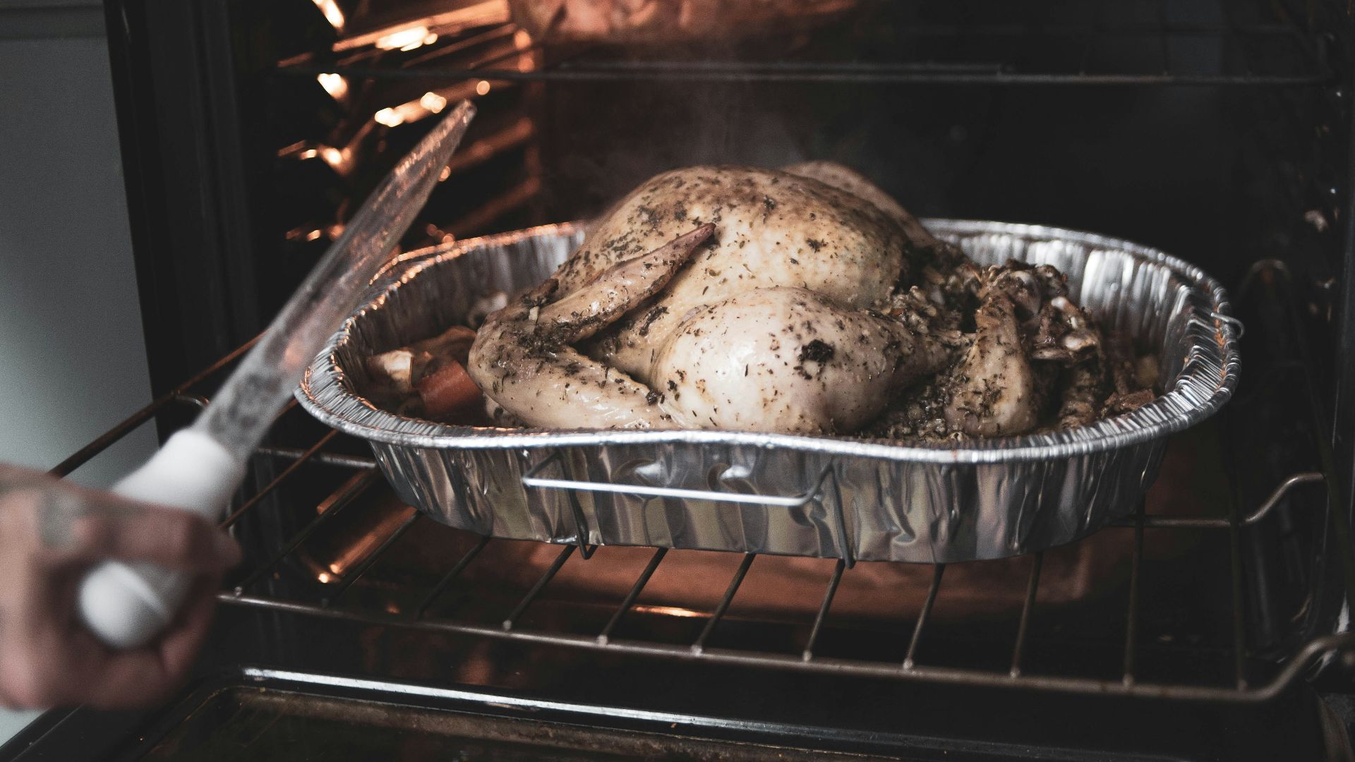 roasted chicken on black metal grill