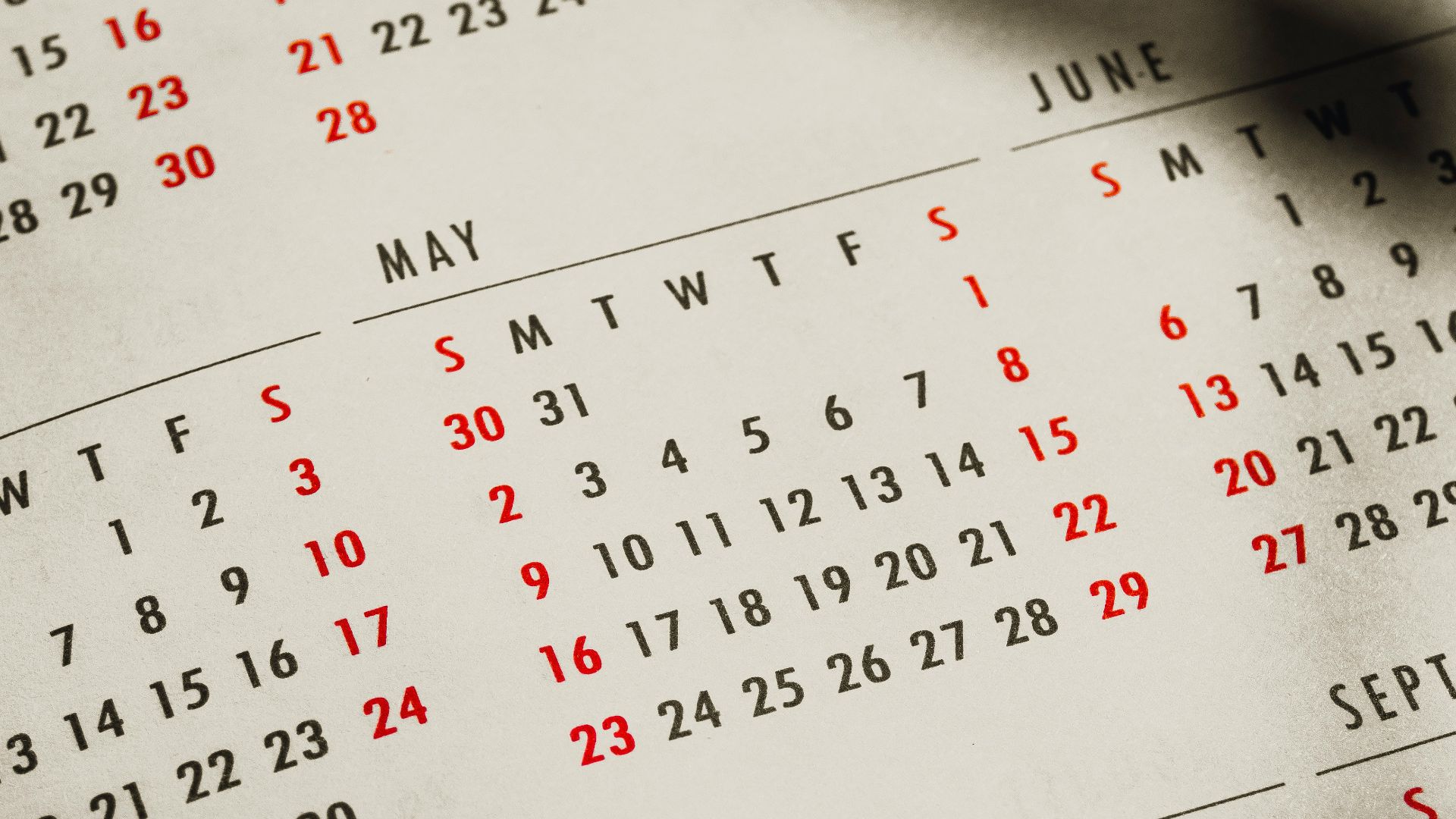 a close up of a calendar on a table