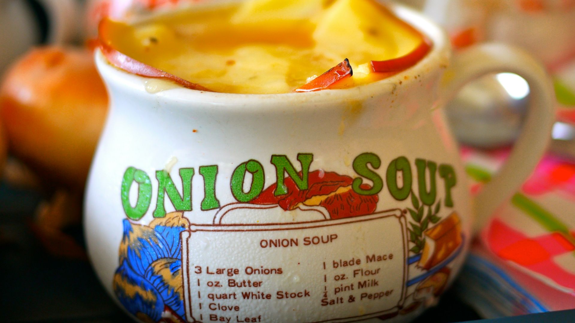 white and red ceramic mug