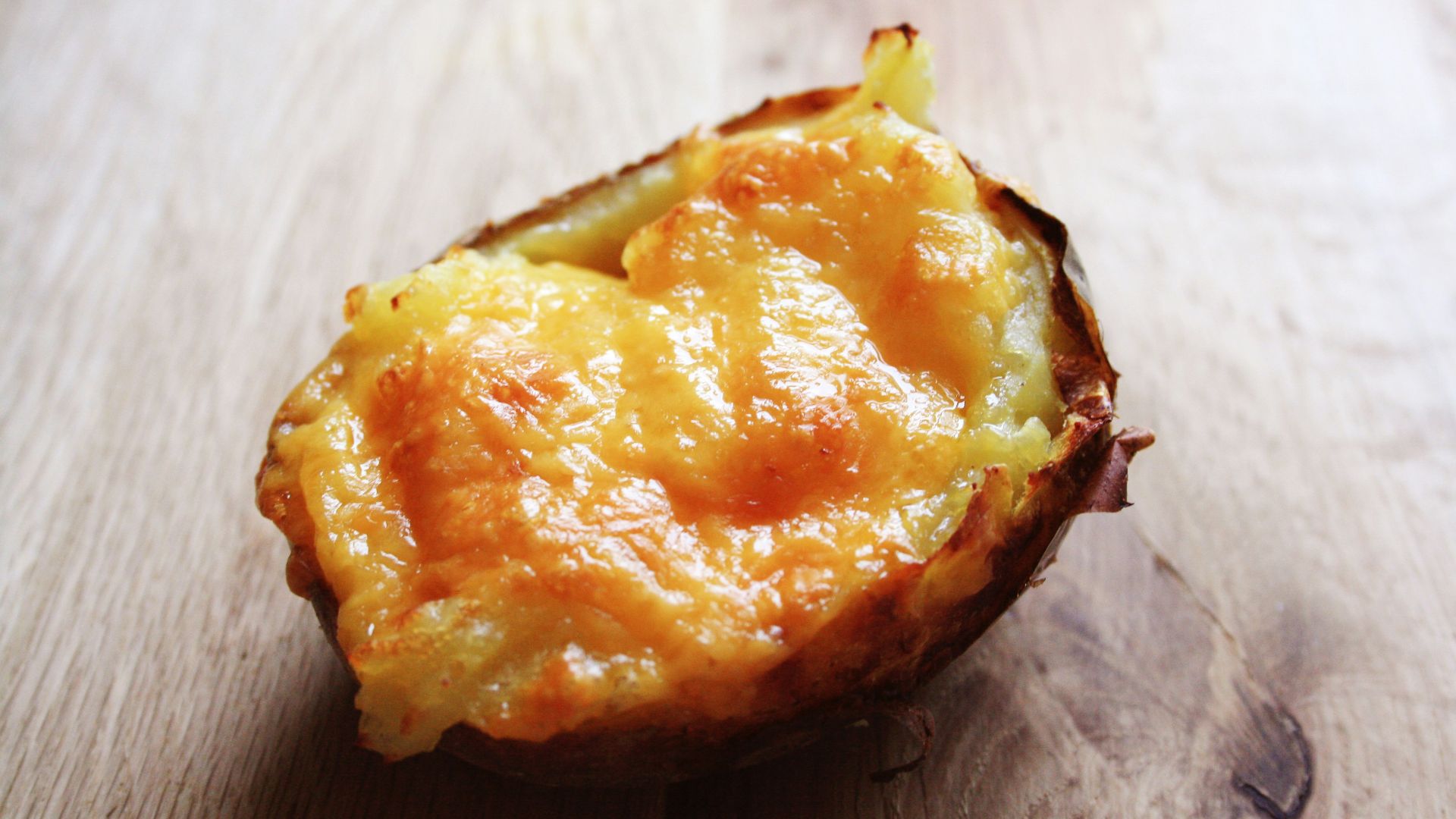 A piece of food sitting on top of a wooden table