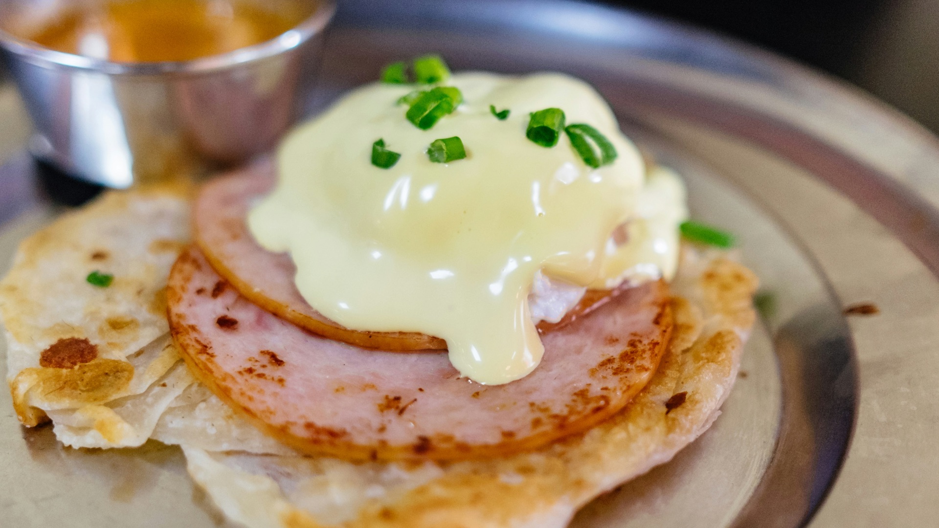 melted cheese on top of cooked ham