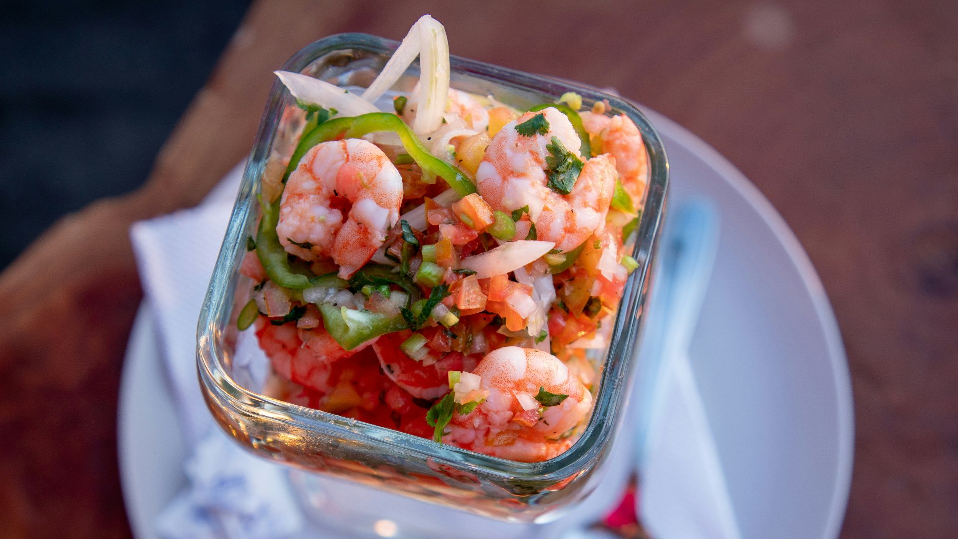 sliced vegetables in clear glass container