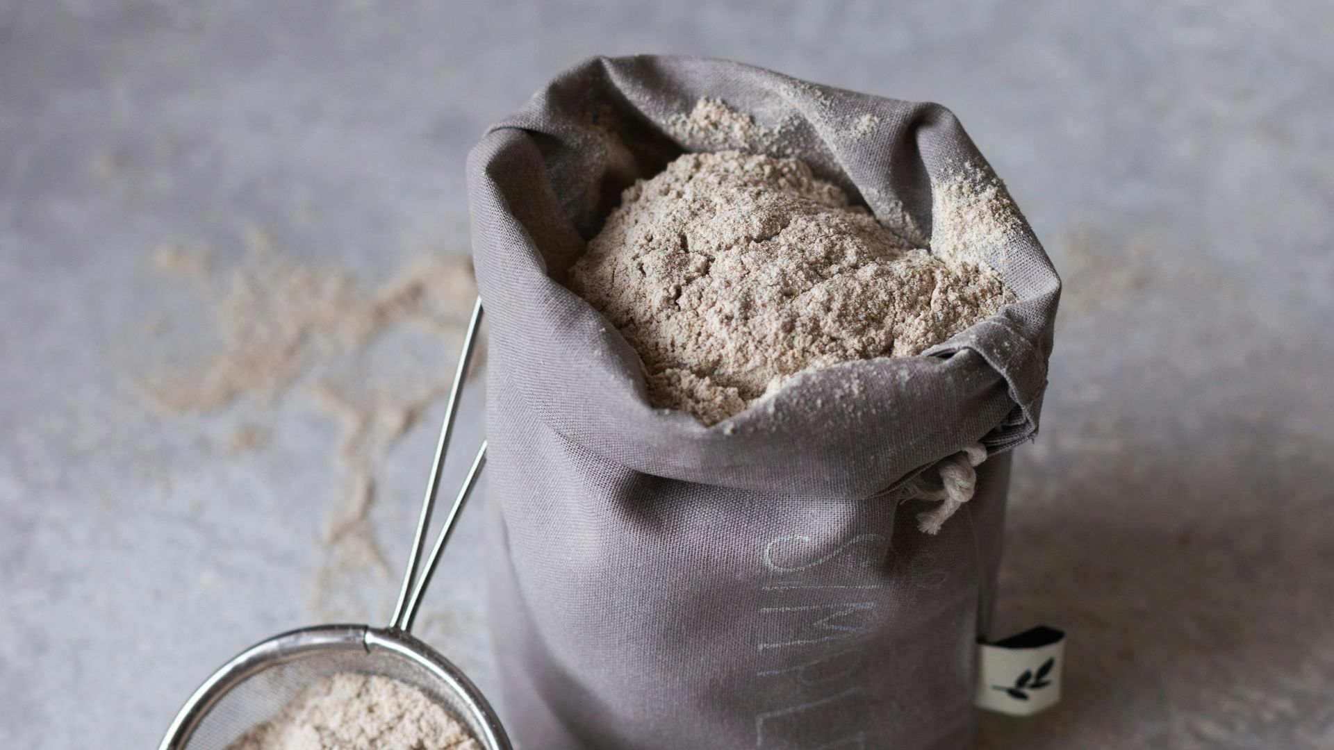 stainless steel cup with brown powder