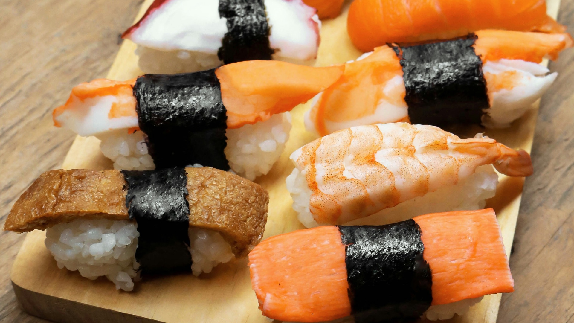 sushi on wooden platter