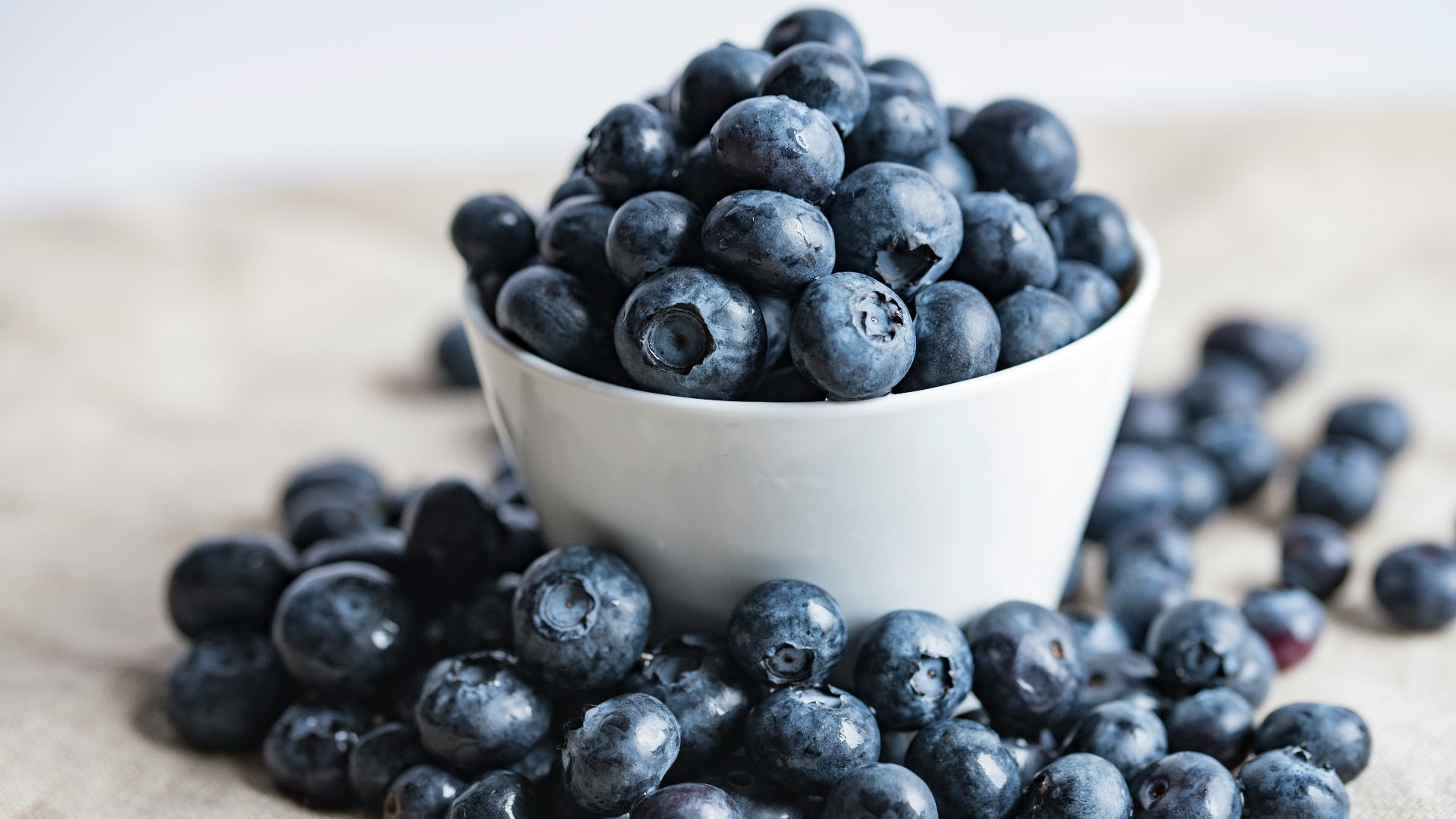 blueberries on white ceramic container