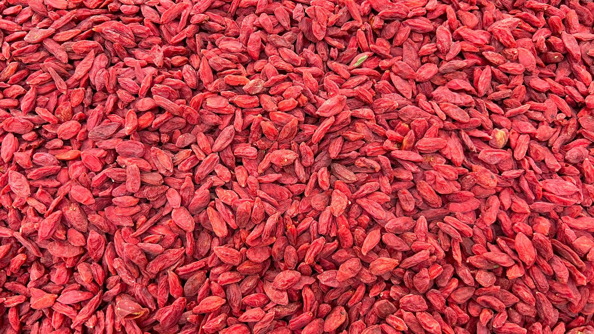 a large pile of red gourmet food