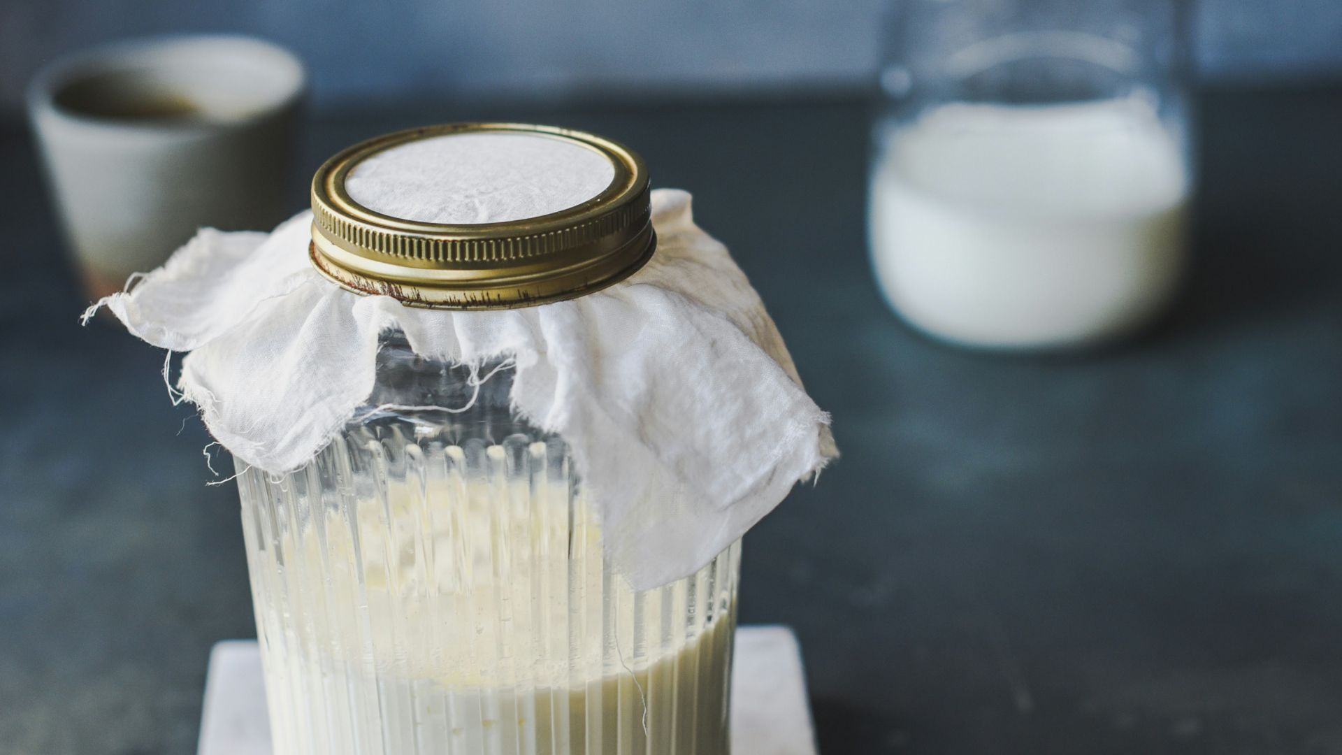 clear glass jar with white liquid