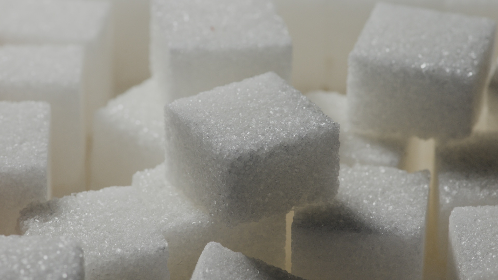 a pile of sugar cubes sitting on top of each other