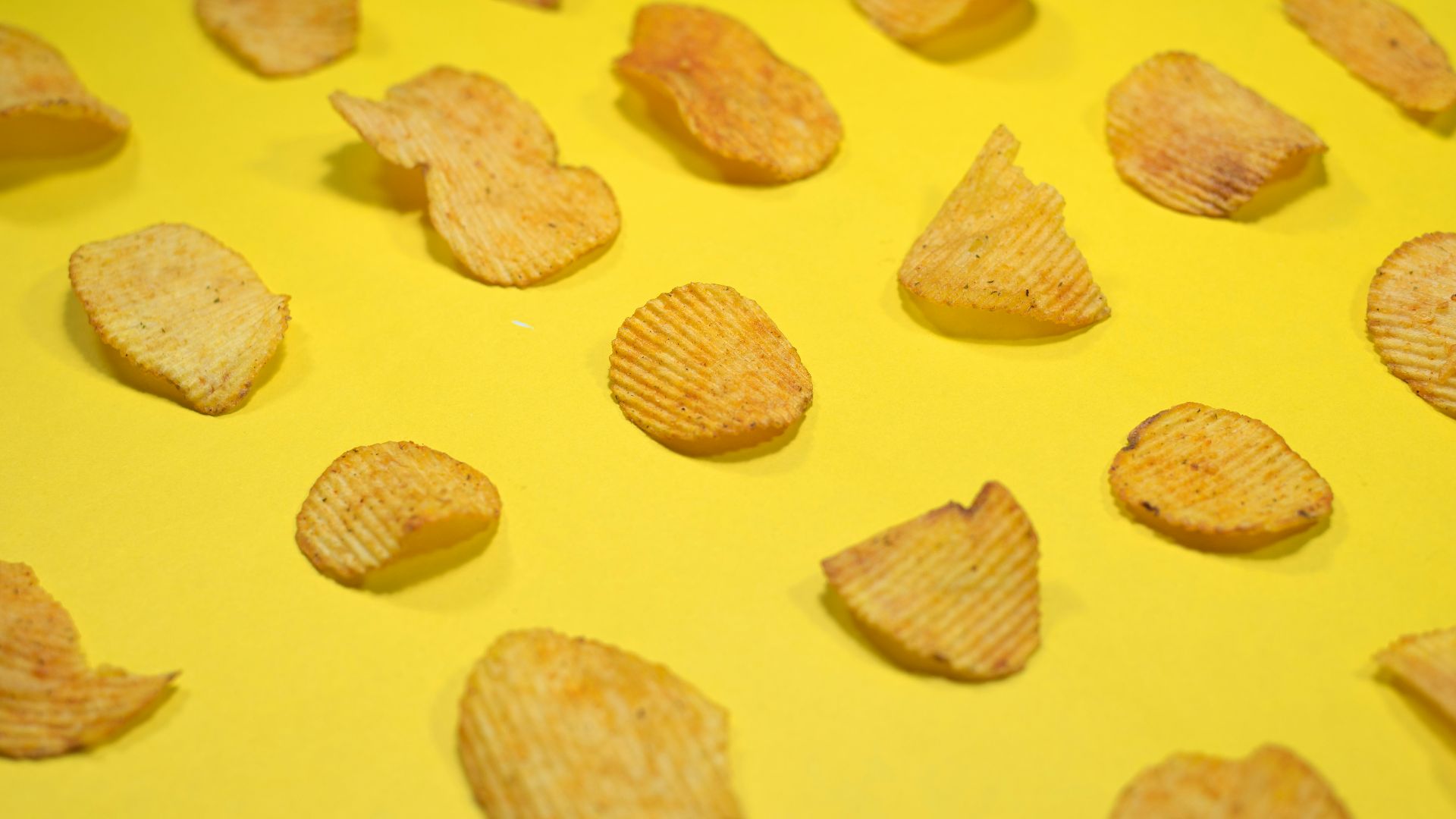 brown cookies on yellow surface