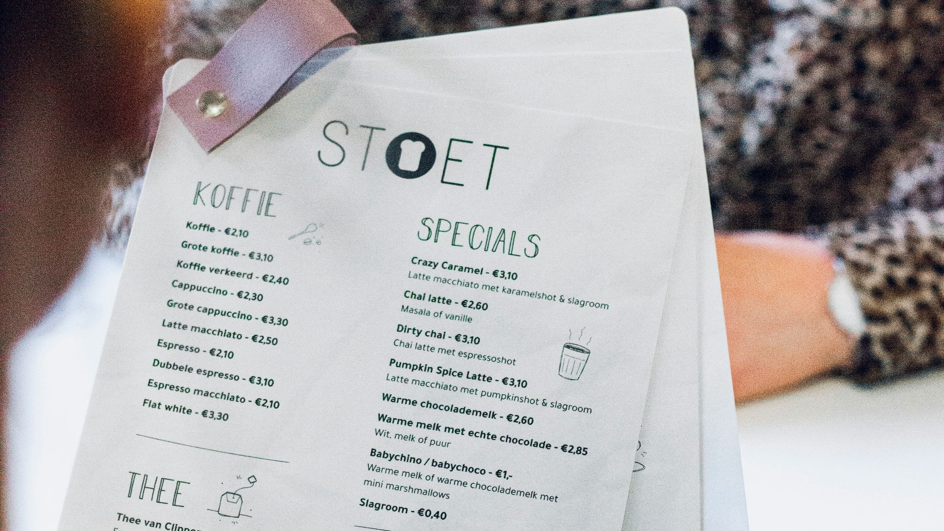 person holding white printer paper