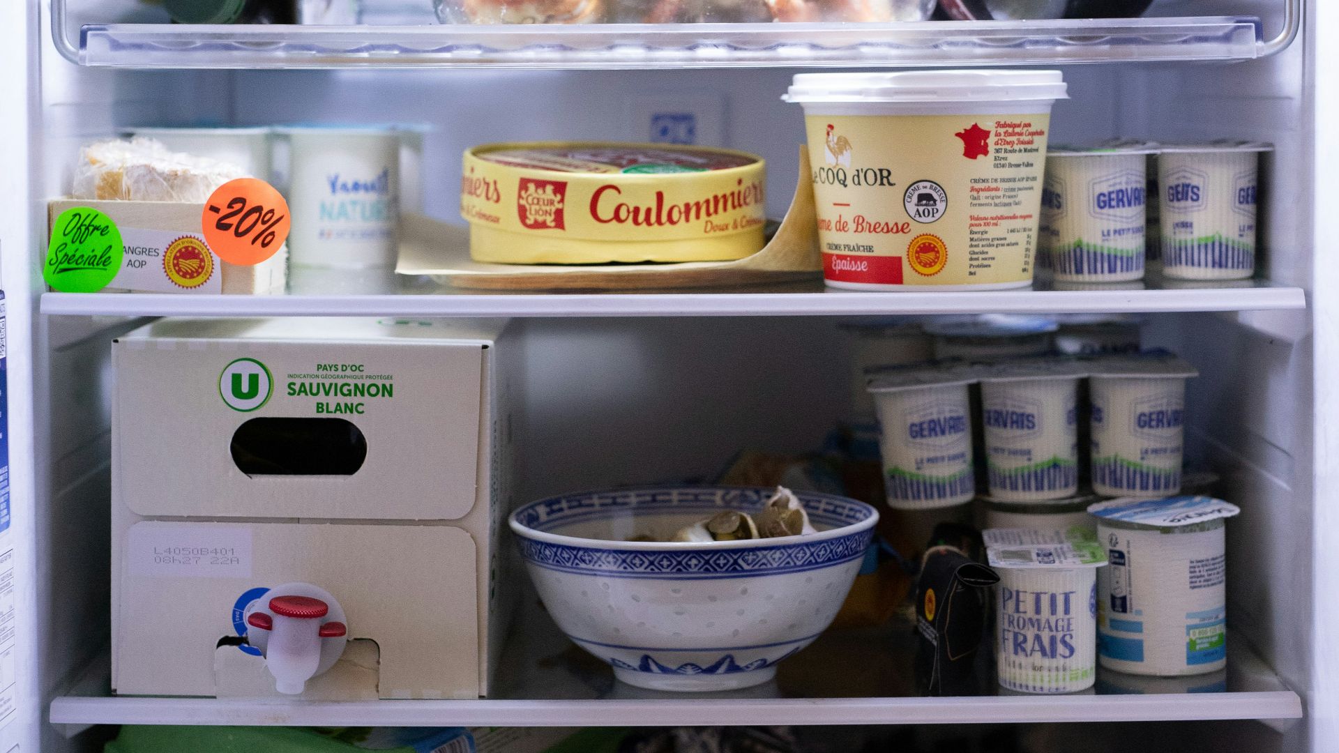 an open refrigerator filled with lots of food