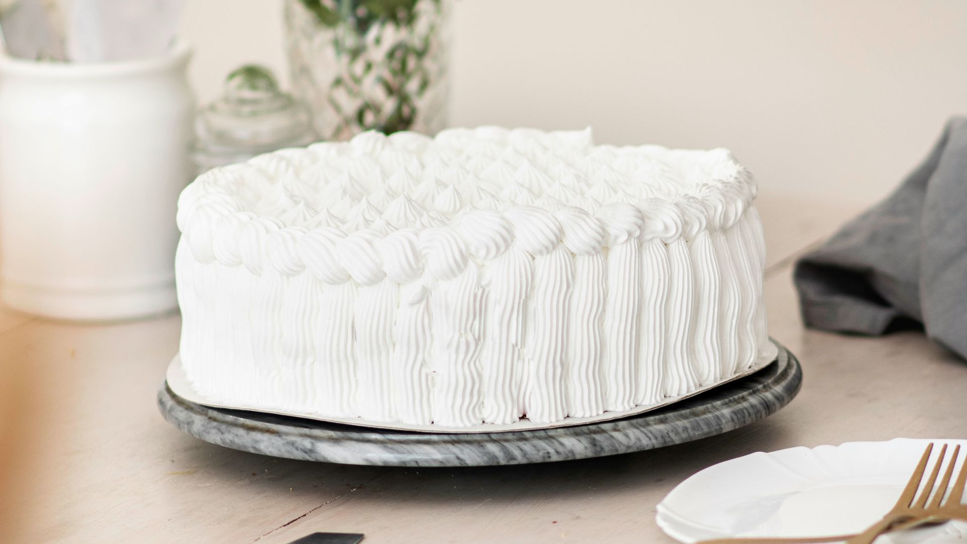 white cake on white ceramic plate