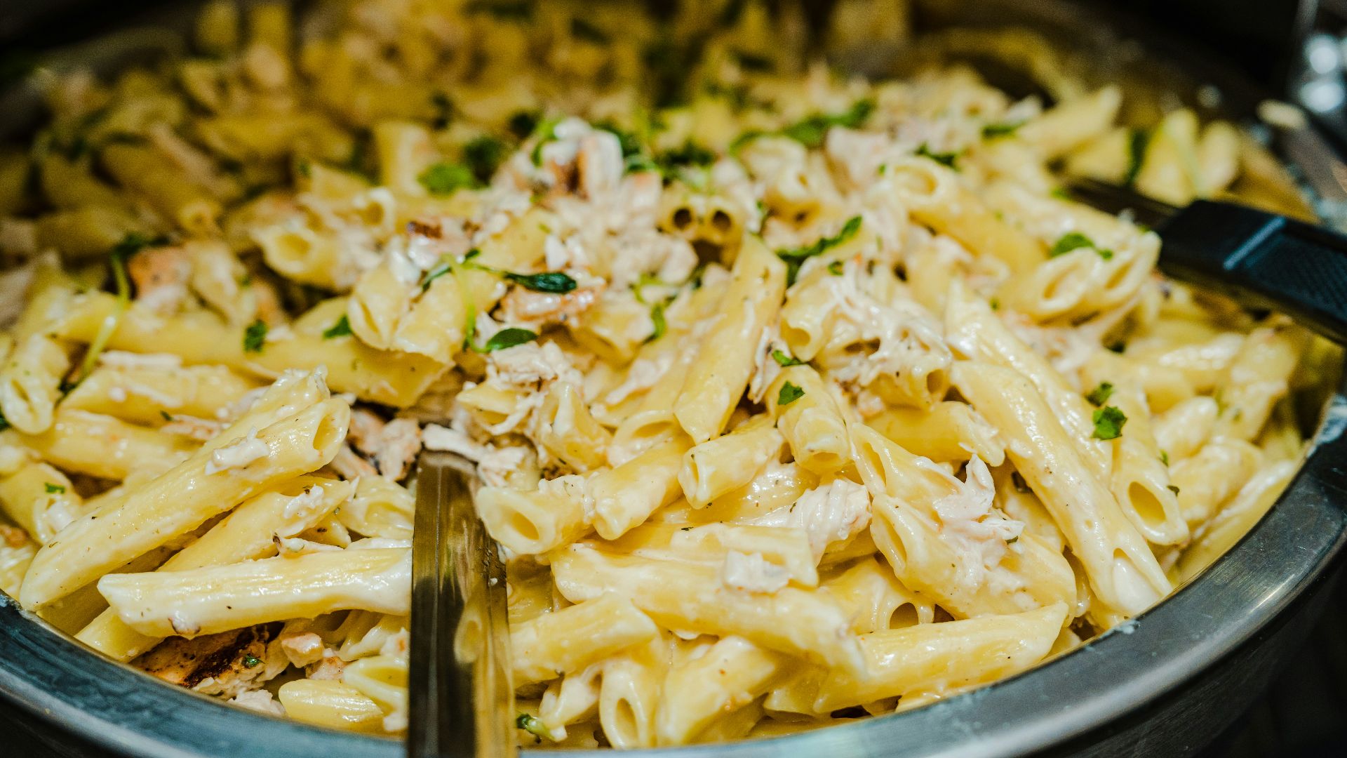 a close up of a plate of food with pasta