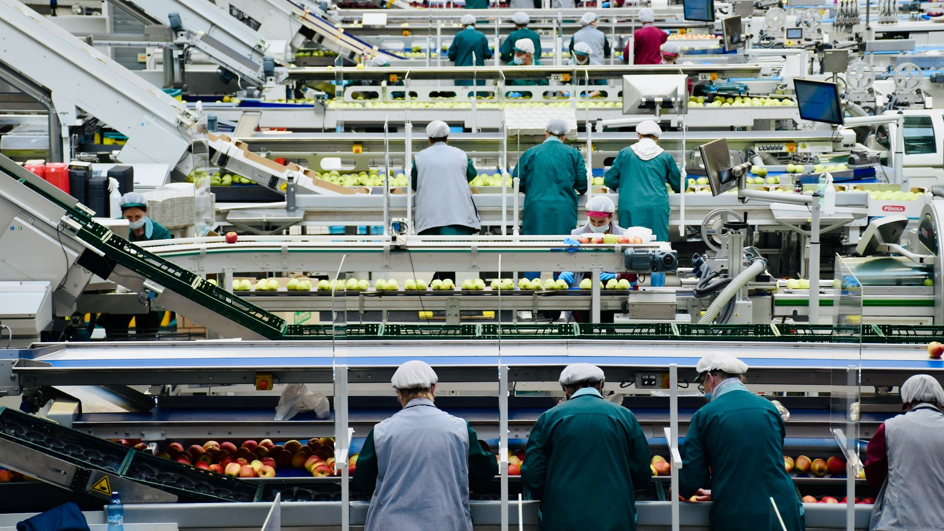 a group of men in a factory