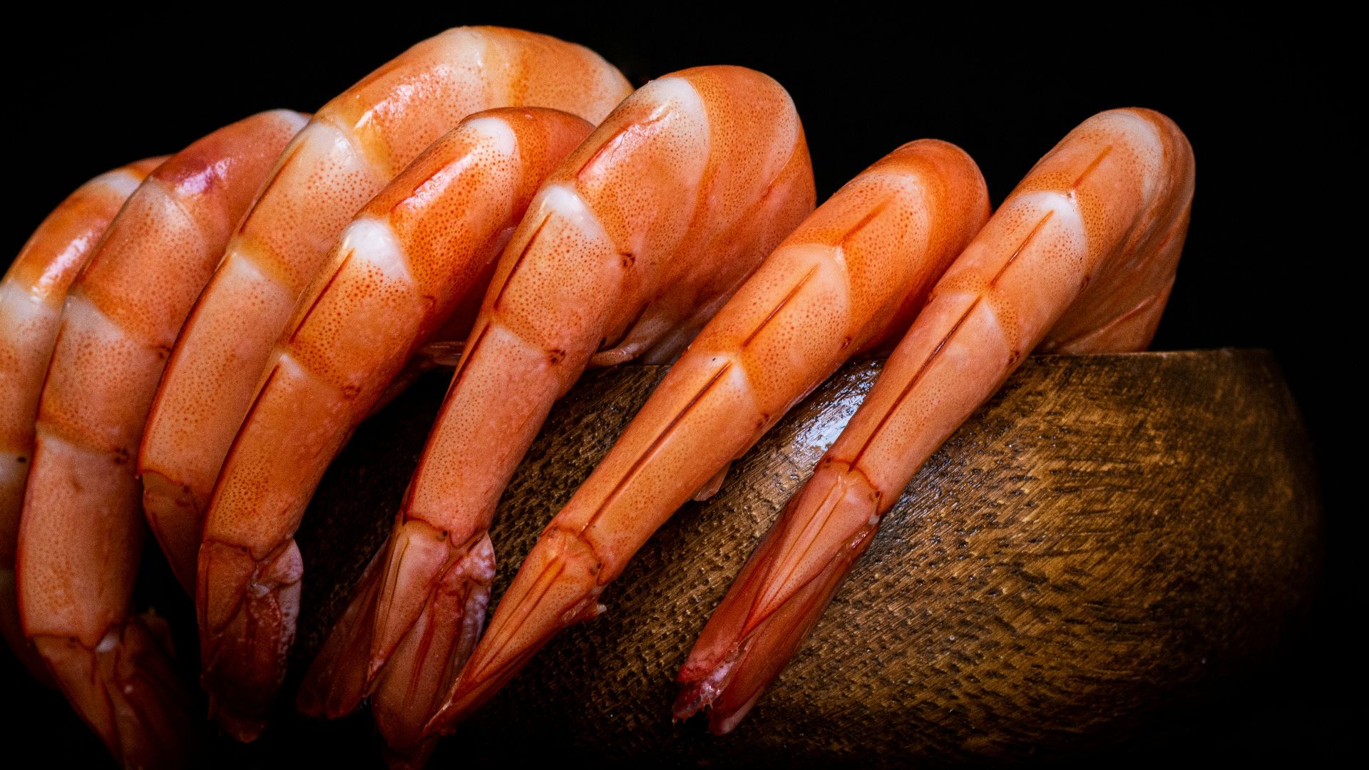 sliced carrots on black surface