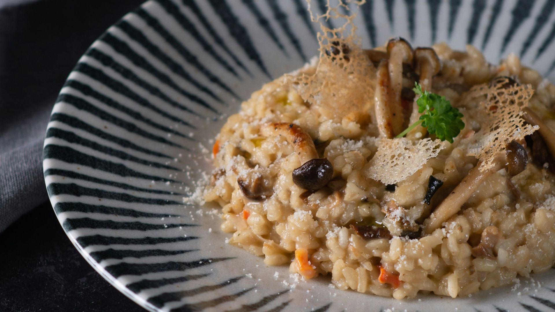 cooked rice with green vegetable on white round plate