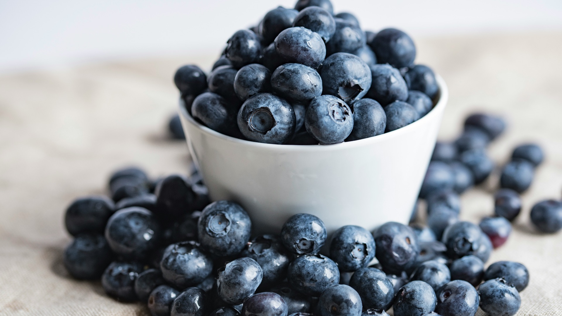 blueberries on white ceramic container