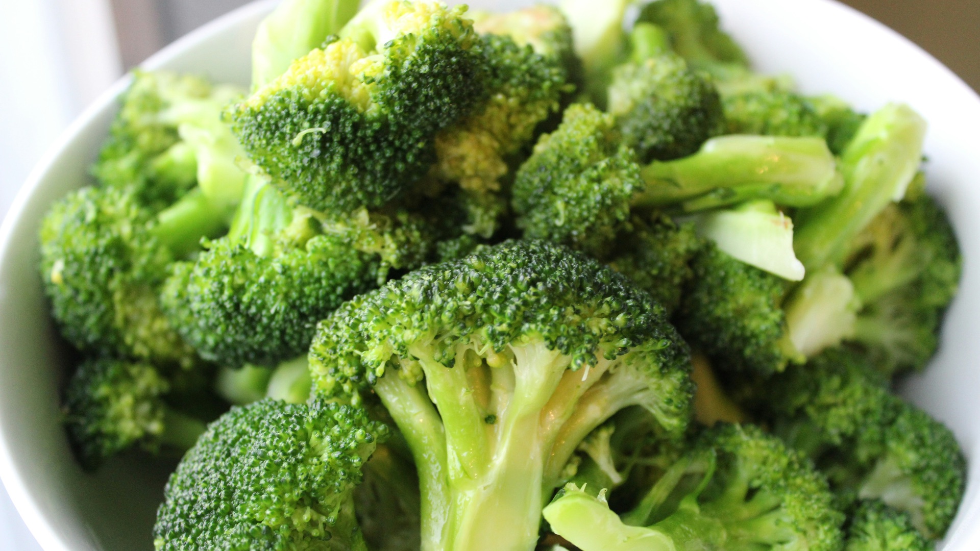 green broccoli on white ceramic plate