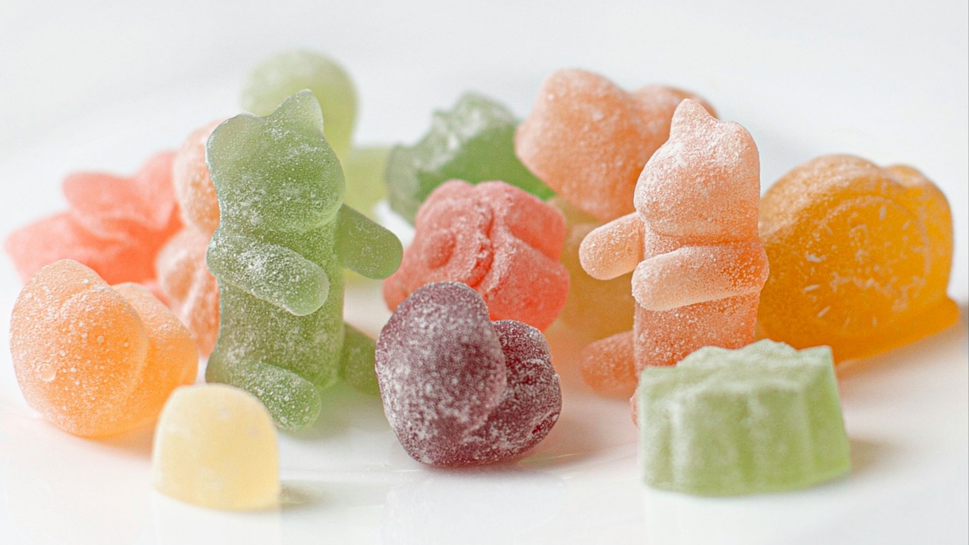 orange green and pink candies