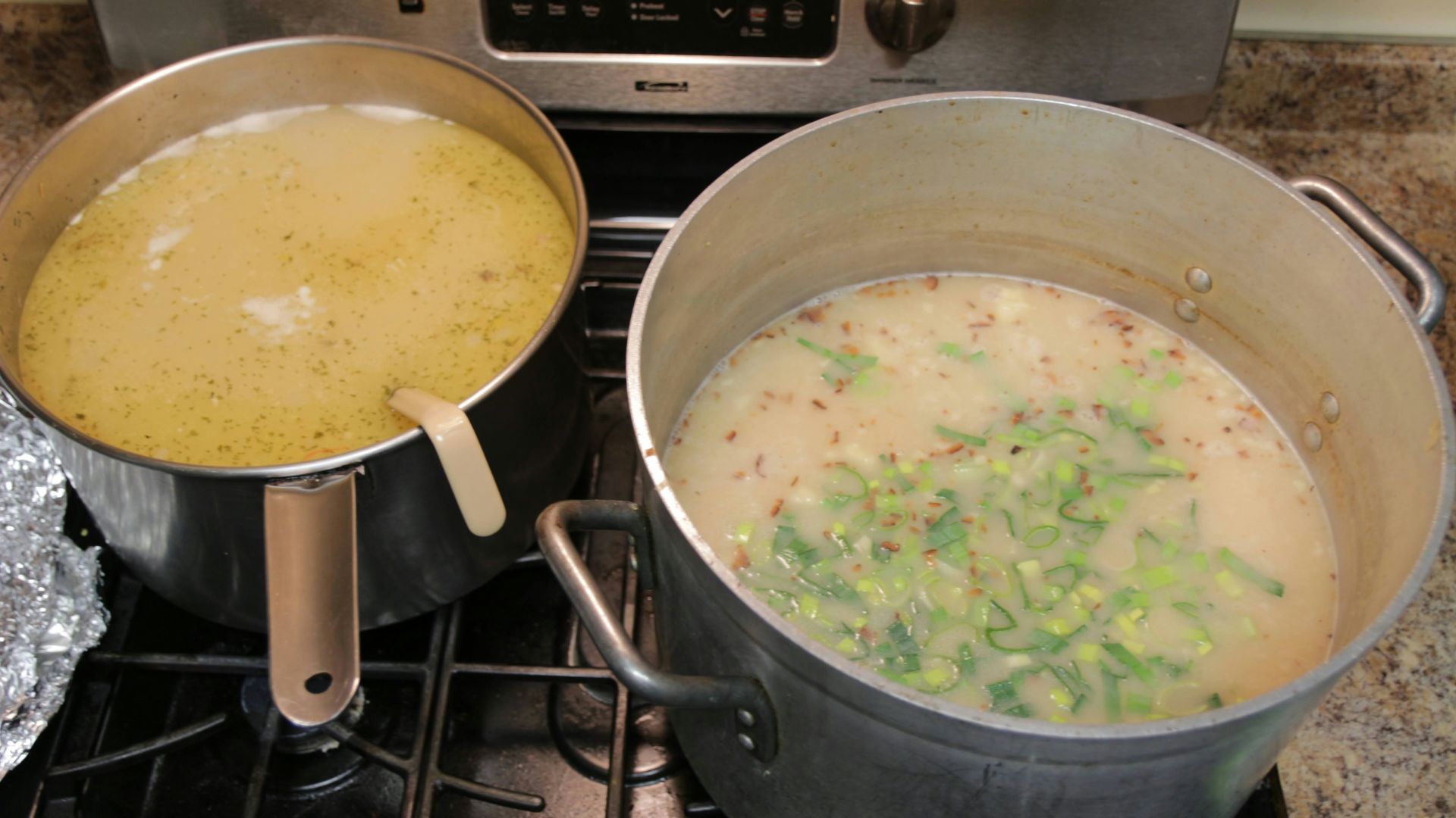 stainless steel cooking pot with green vegetable