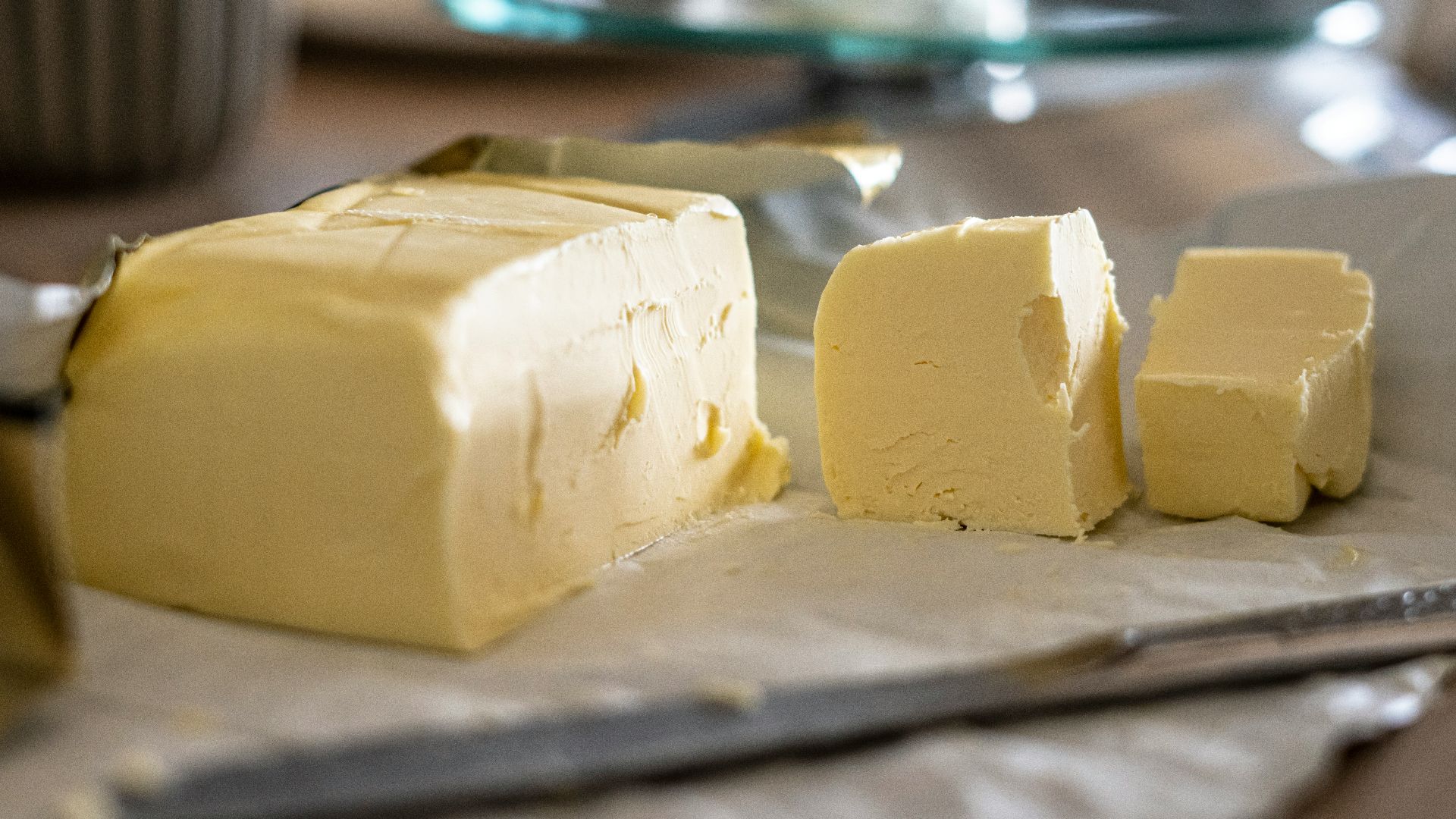 sliced cheese on clear glass plate