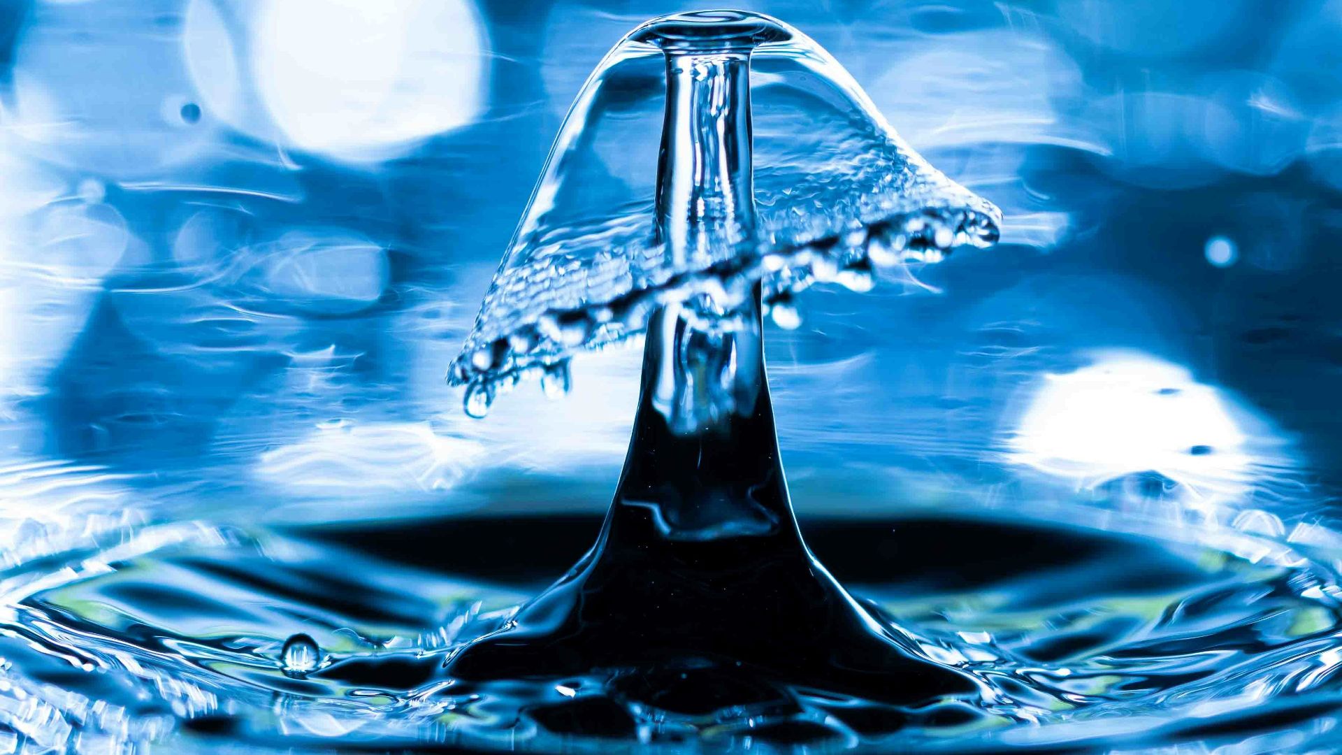 a drop of water falling into water