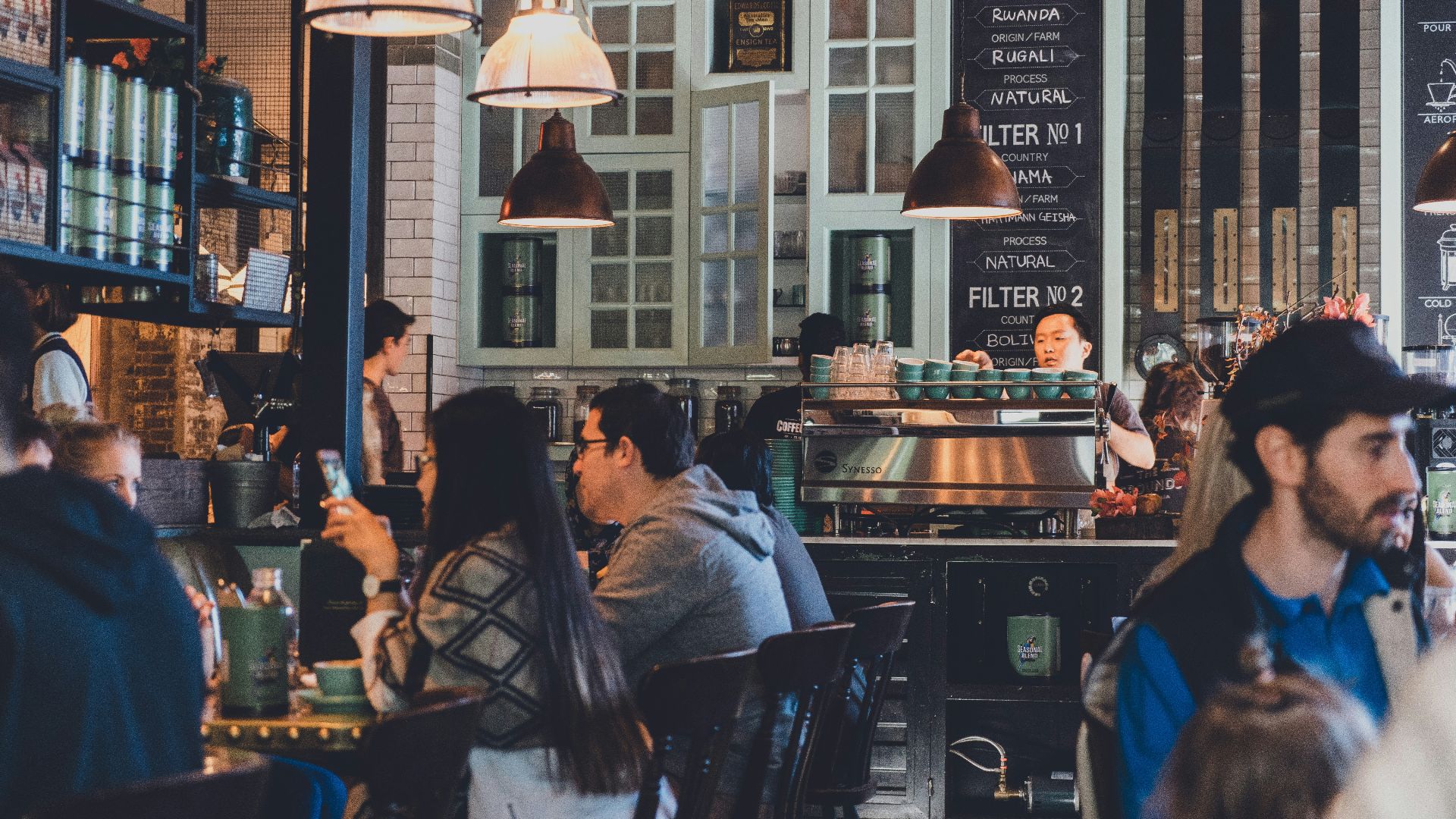 group of people eating on restaurant