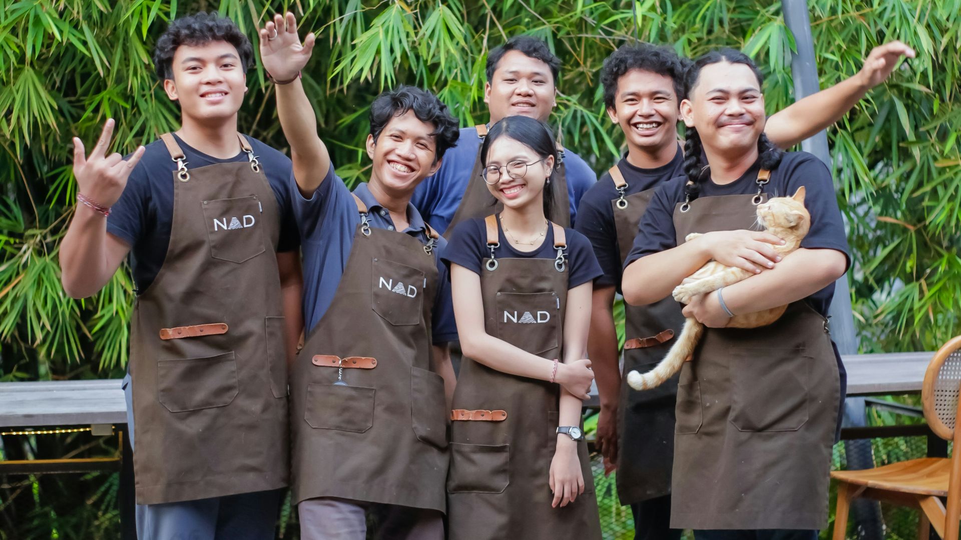 A group of people standing next to each other