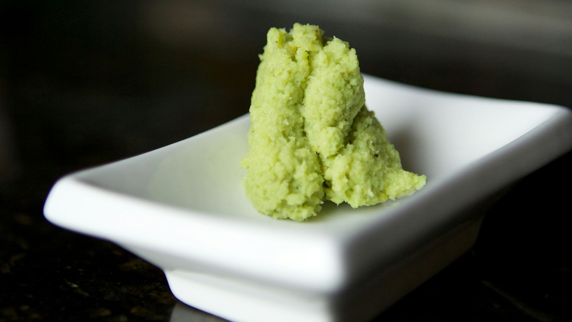 green powder on white ceramic plate