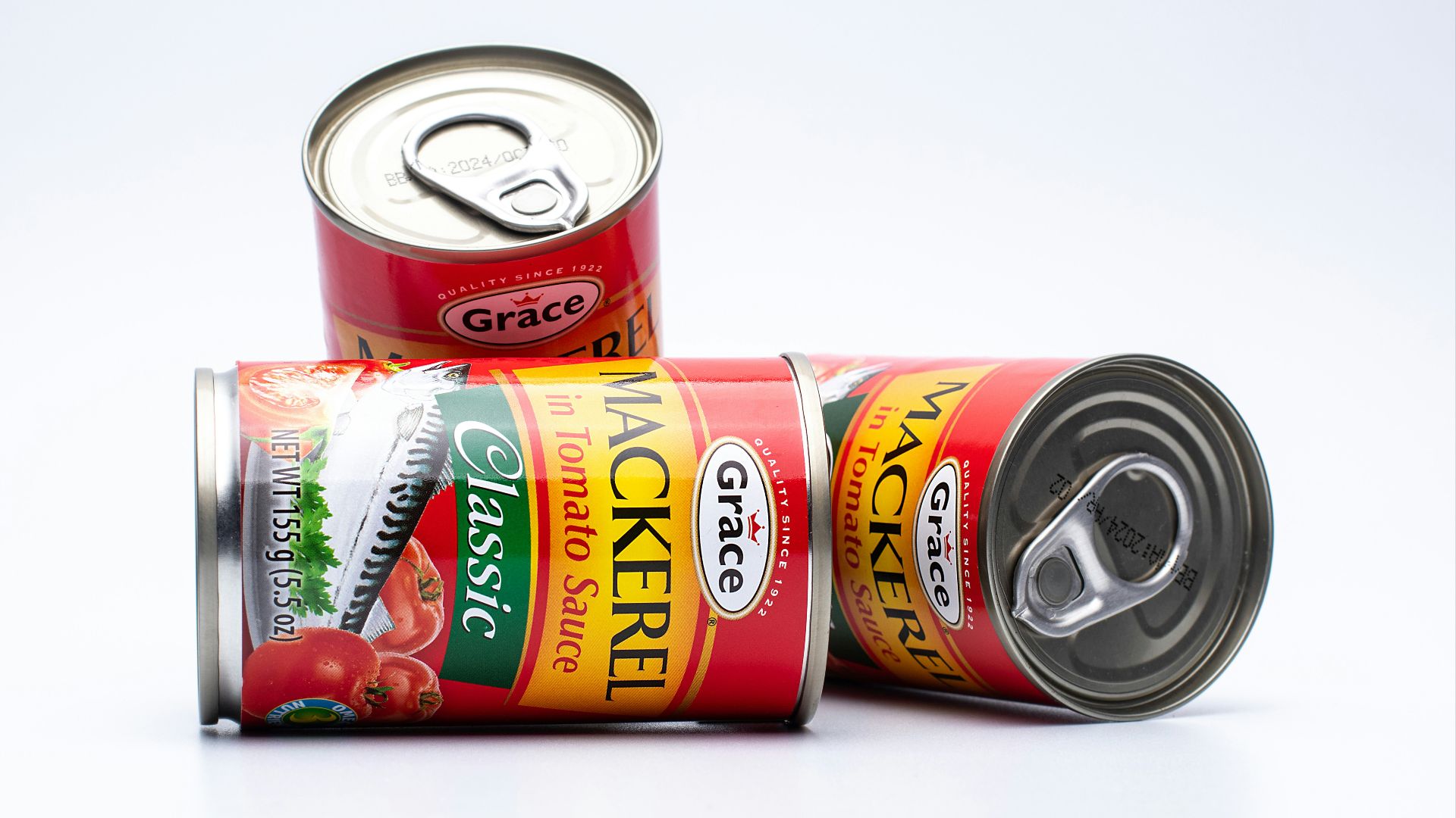two cans of canned food sitting next to each other