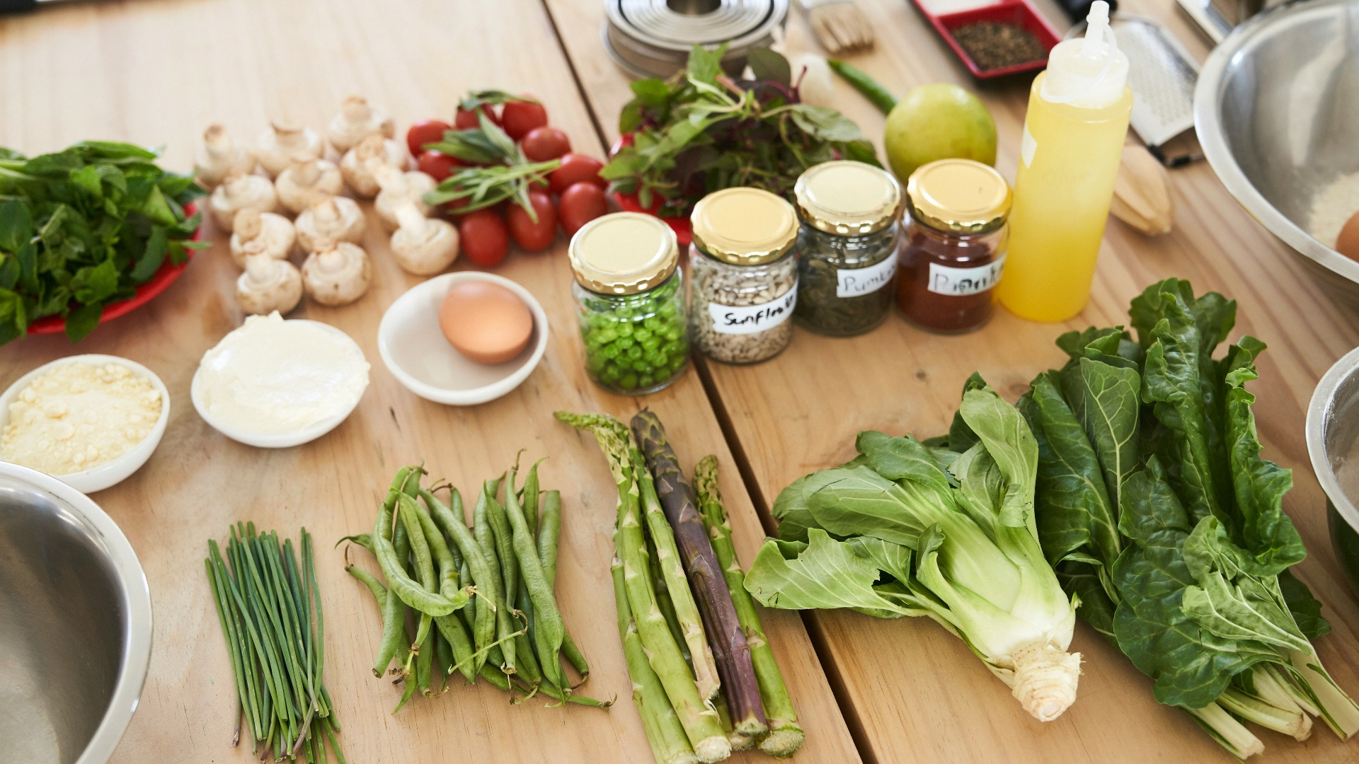 green vegetable on brown wooden table