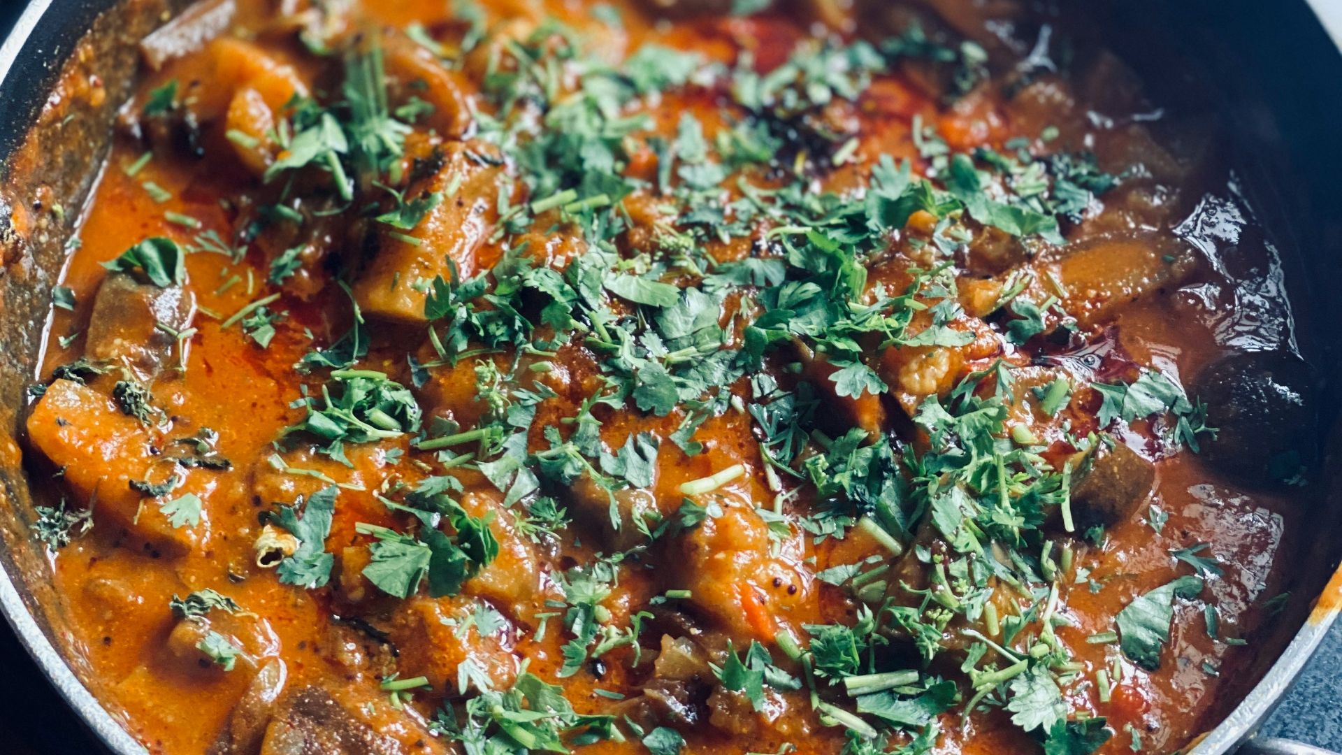 cooked food in black cooking pot