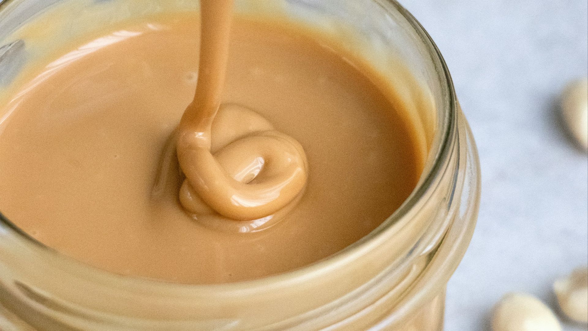 clear glass jar with brown liquid