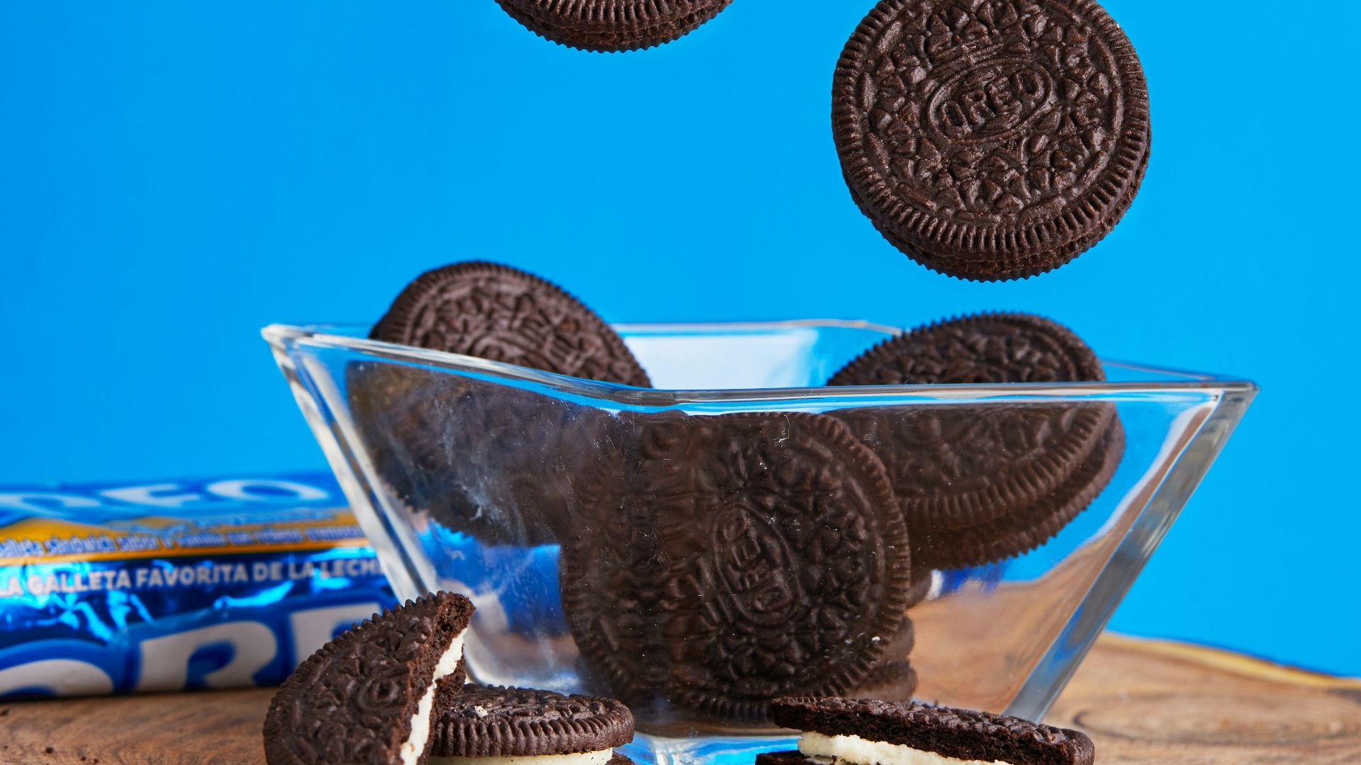 stainless steel bowl on brown wooden table