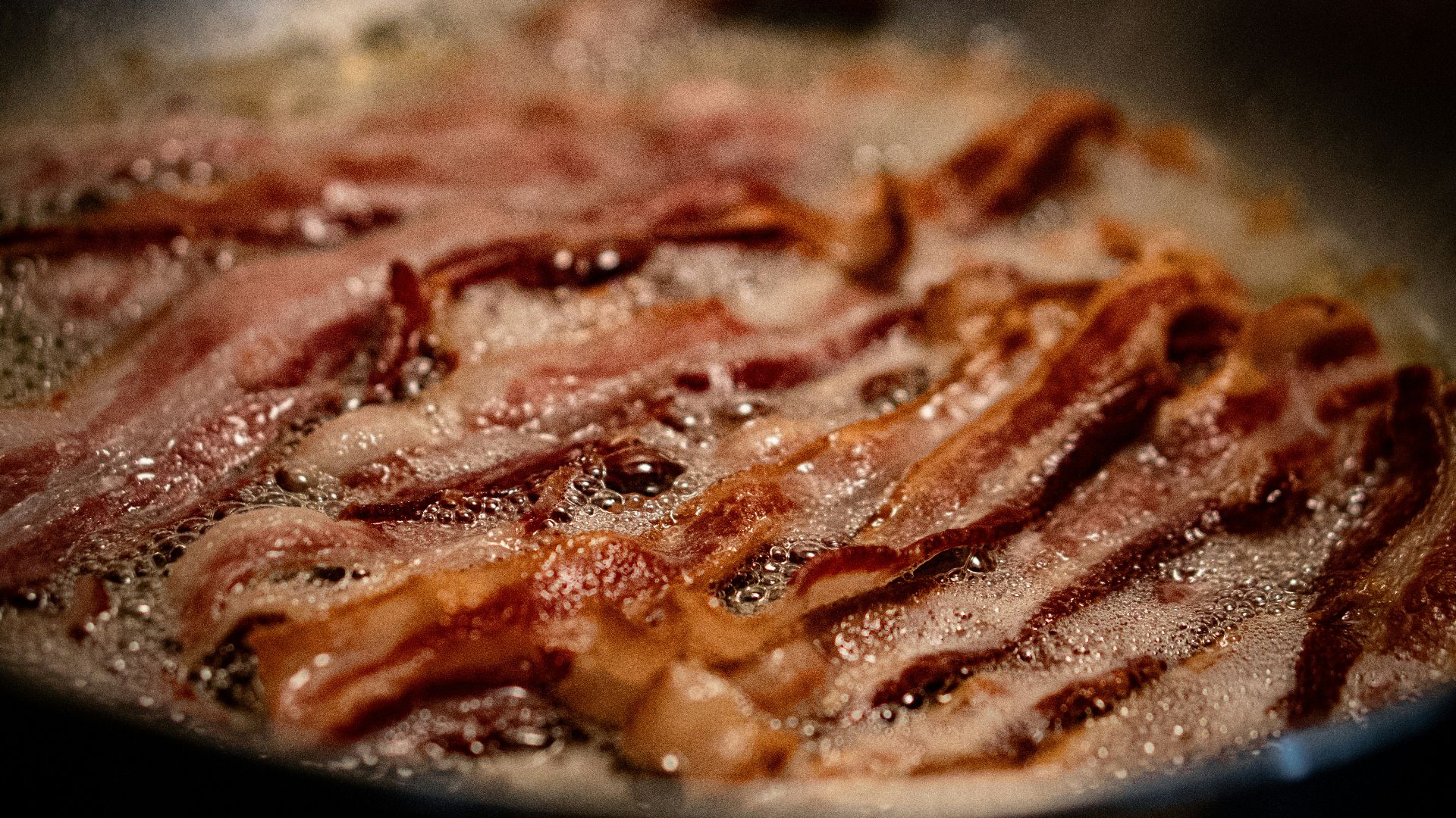 A close up of a frying pan on a stove