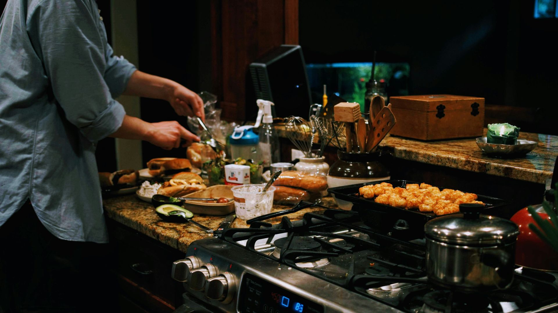 a person cooking food on a stove
