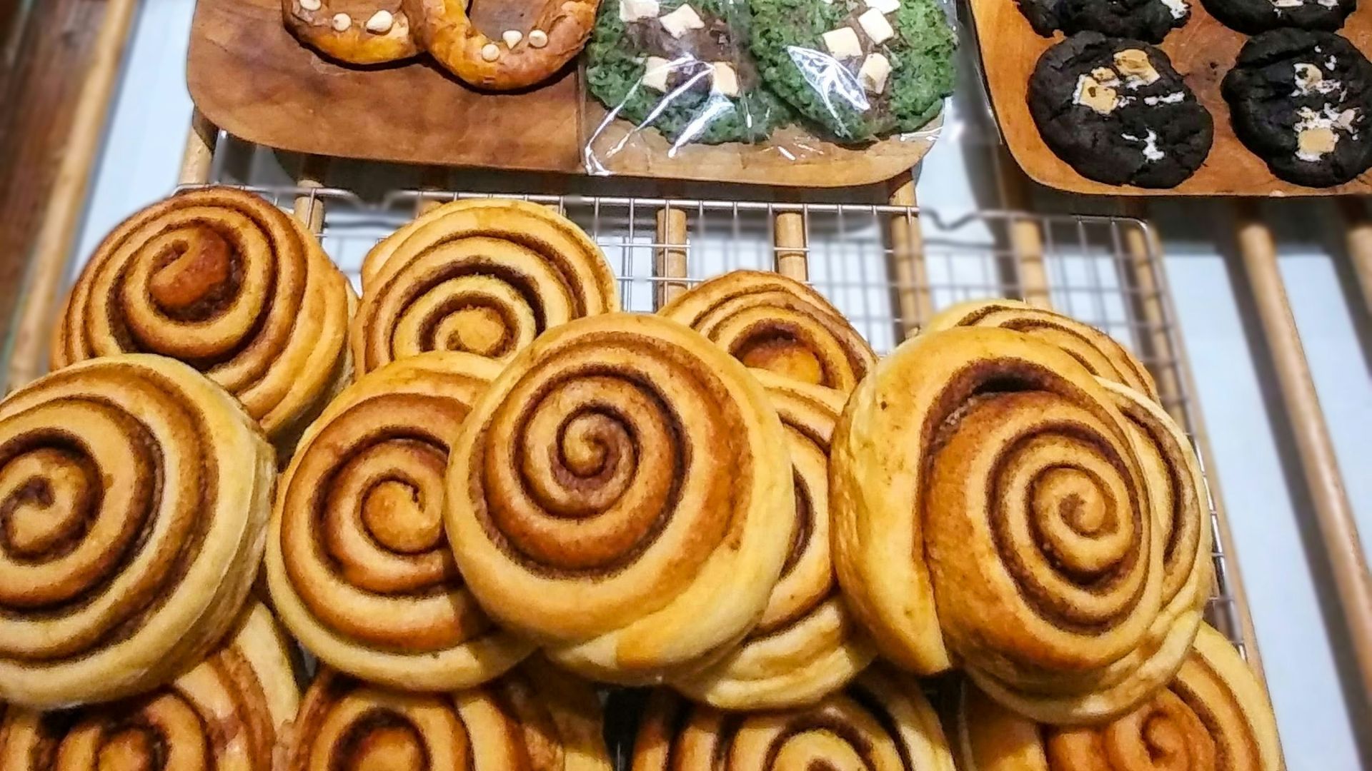 a table filled with lots of different types of pastries