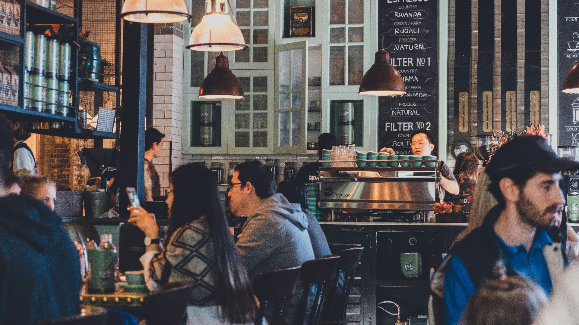 group of people eating on restaurant
